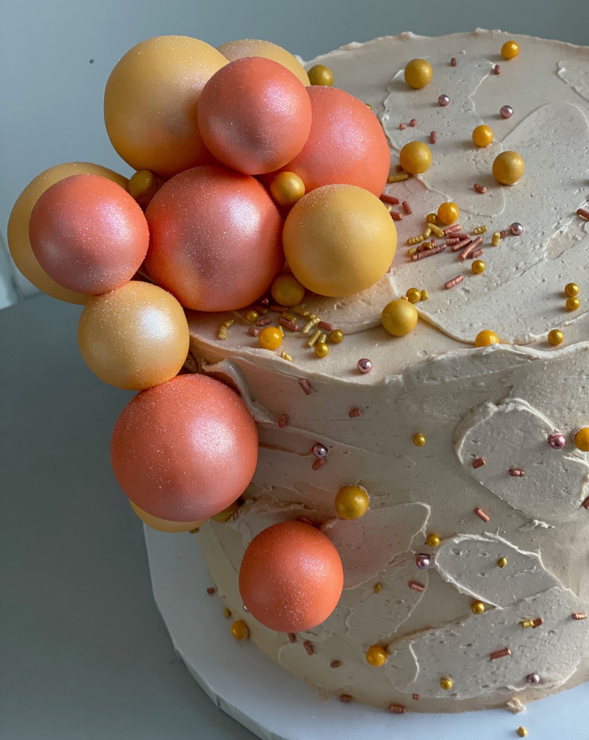 Splashed & textured spheres on buttercream - custom cake