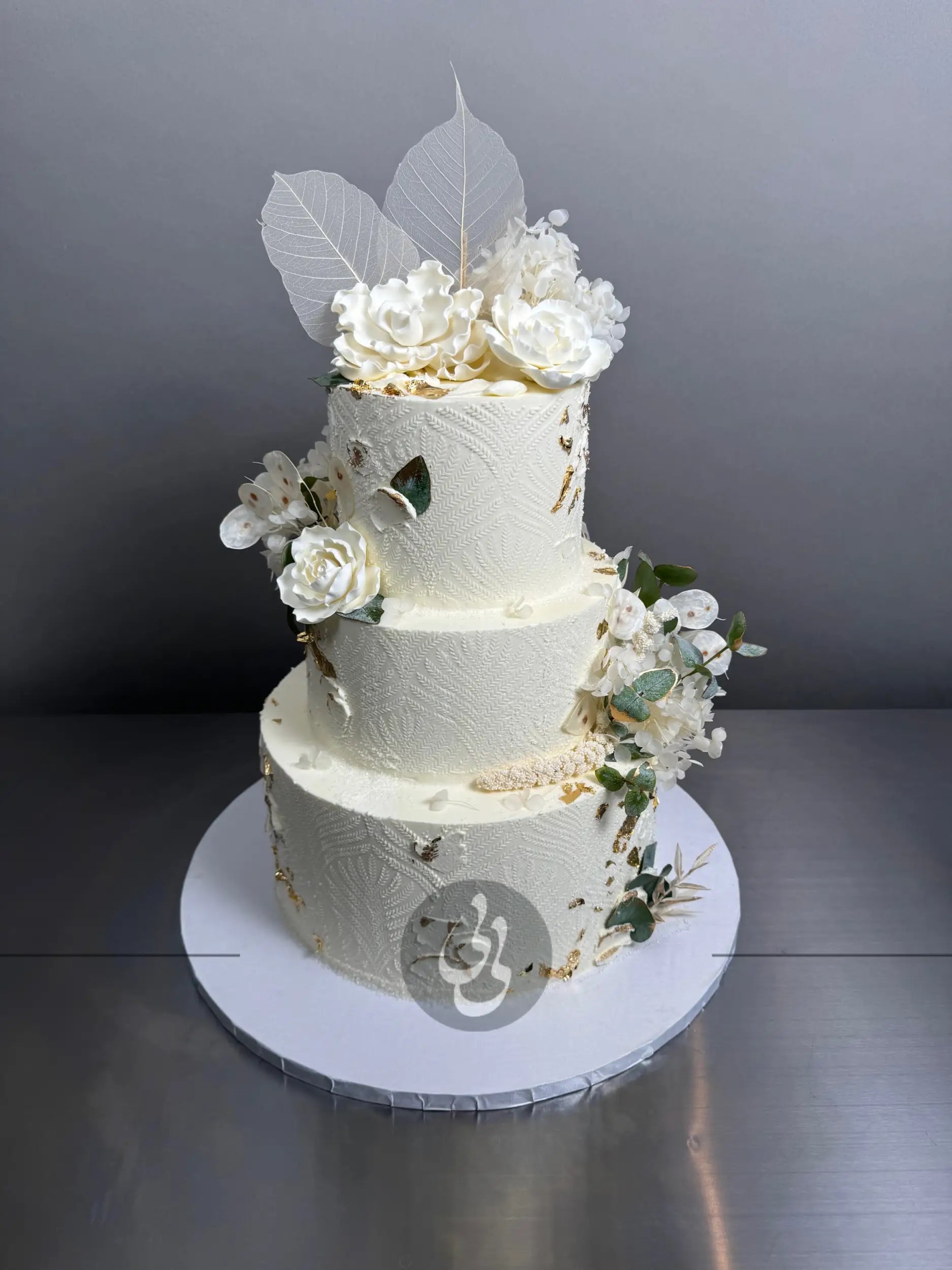 Stenciled boho & sugar flowers - wedding cake