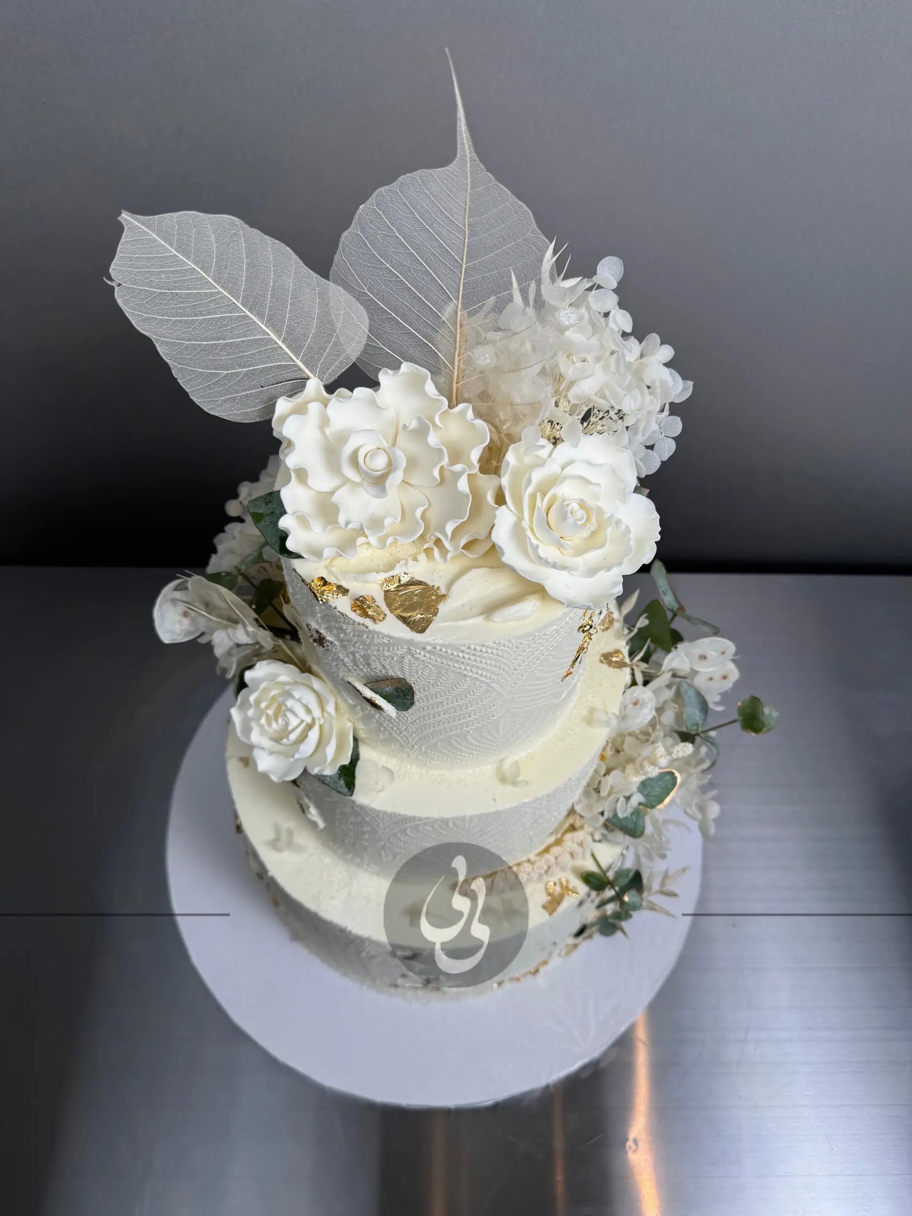 Stenciled boho & sugar flowers - wedding cake