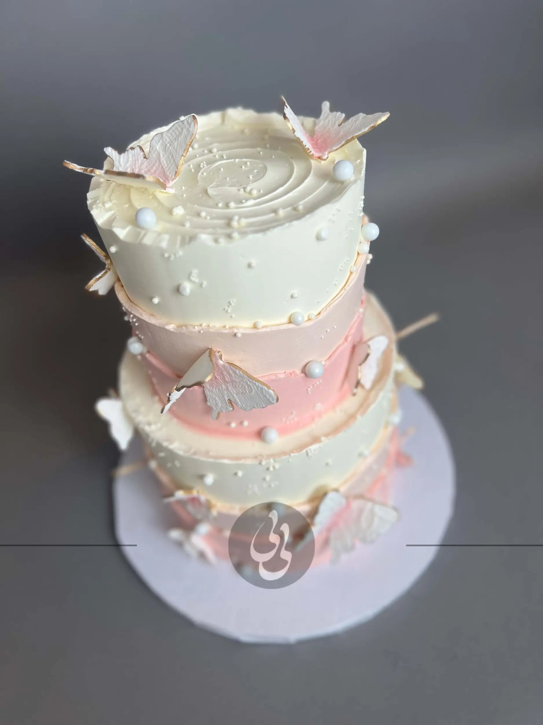 Sugar butterflies on layered buttercream - custom cake