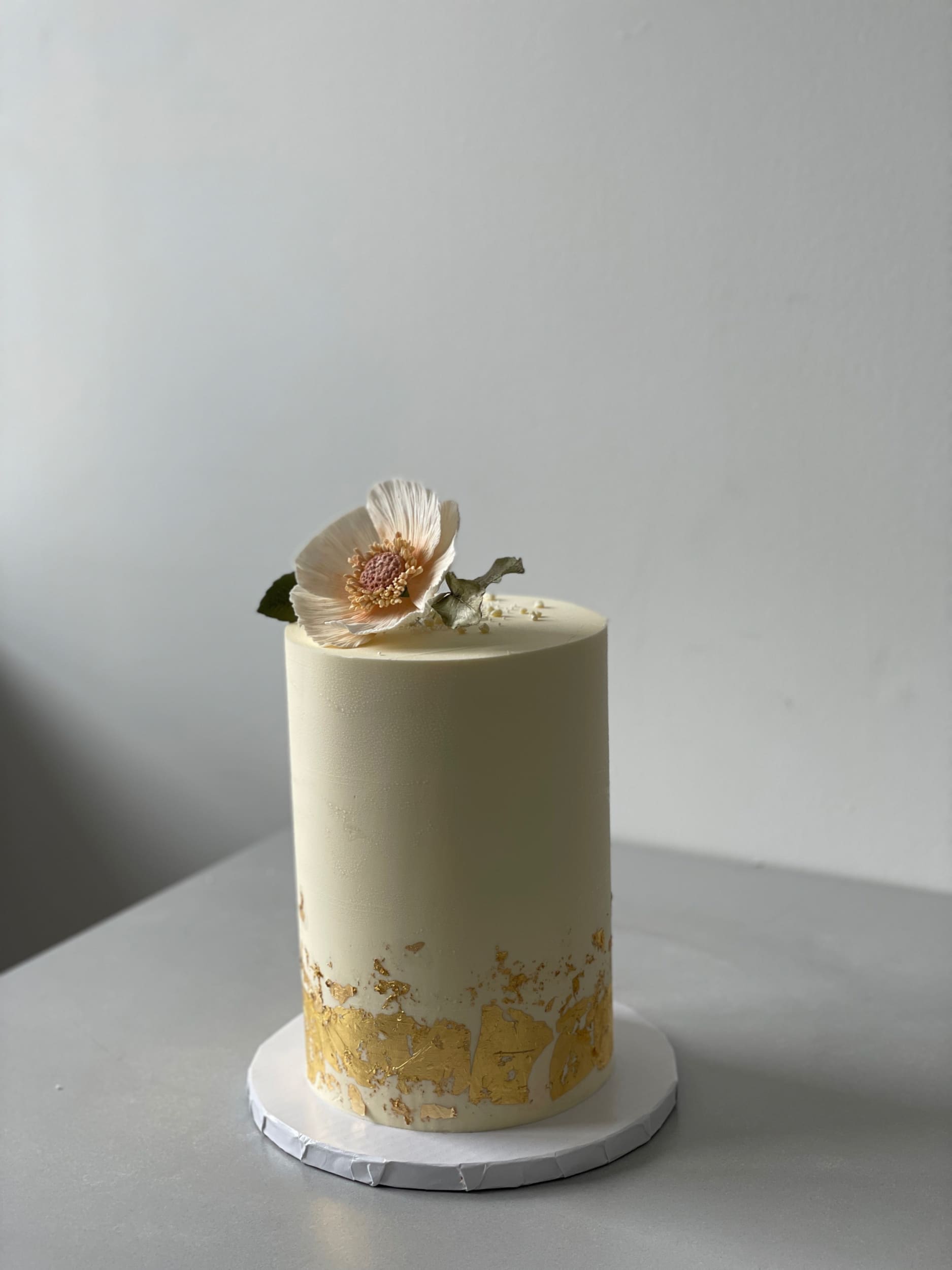 Sugar flower & gold foil on buttercream - custom cake