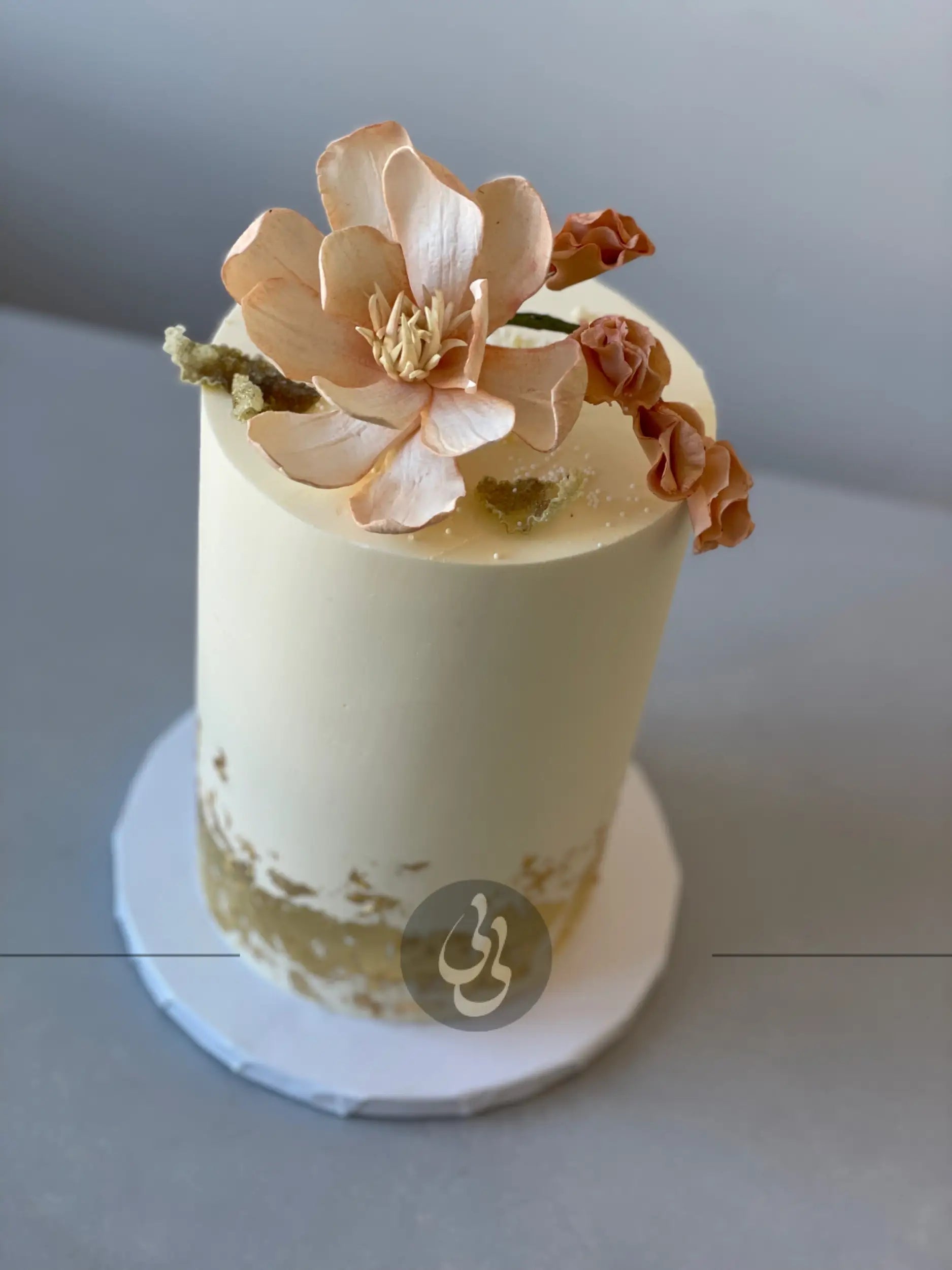 Sugar flower & gold foil on buttercream - custom cake