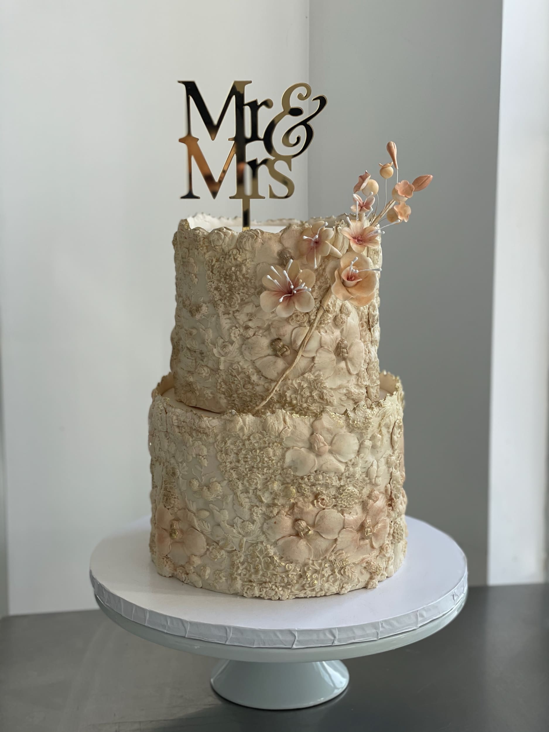 Sugar flower on floral imprinted fondant - custom cake