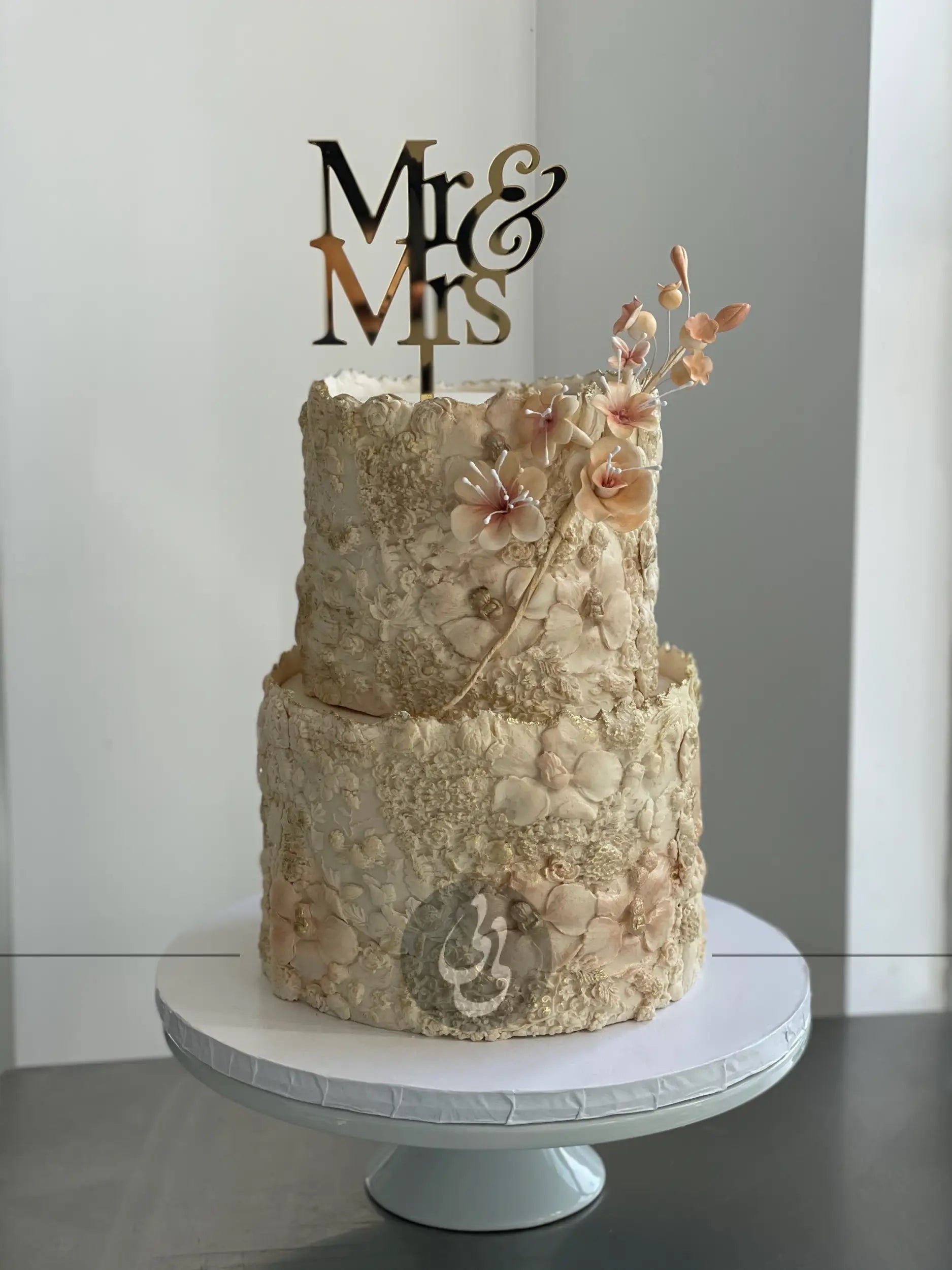 Sugar flower on floral imprinted fondant - custom cake