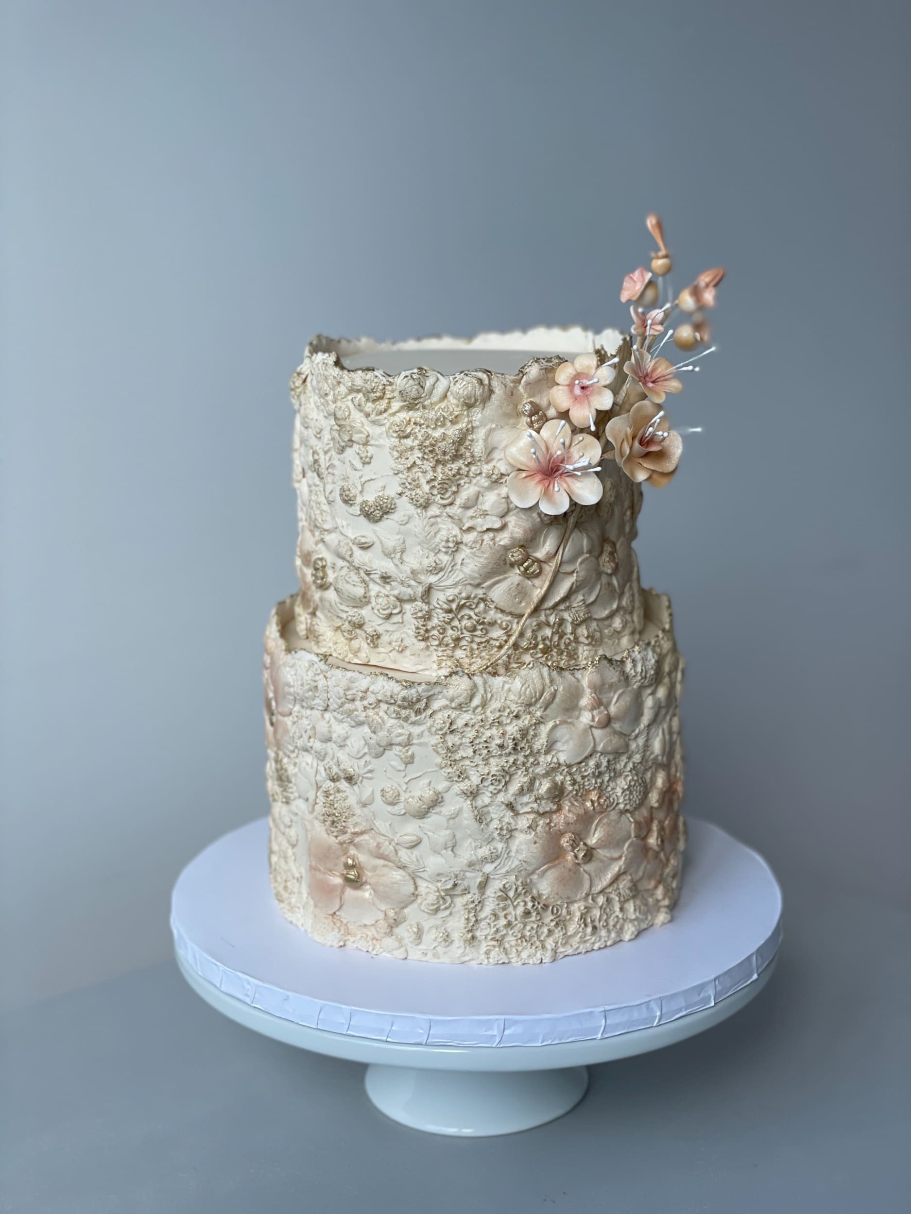 Sugar flower on floral imprinted fondant - custom cake