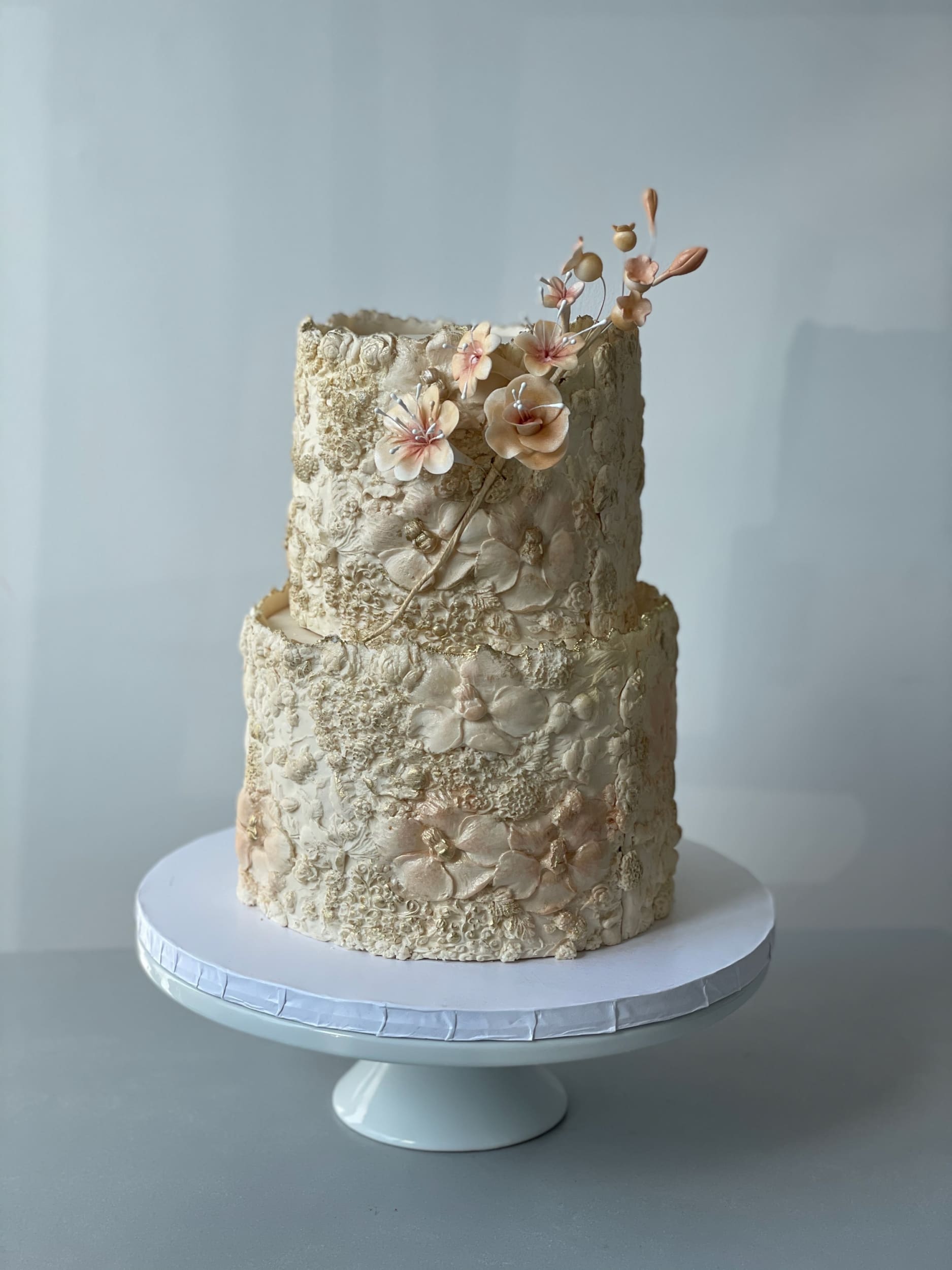 Sugar flower on floral imprinted fondant - custom cake
