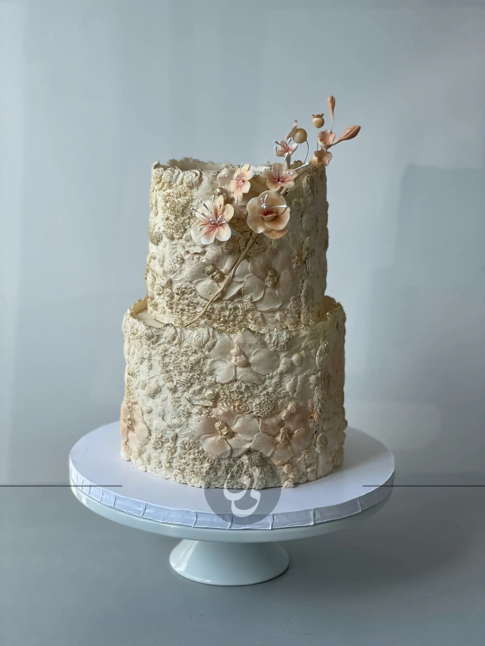 Sugar flower on floral imprinted fondant - custom cake