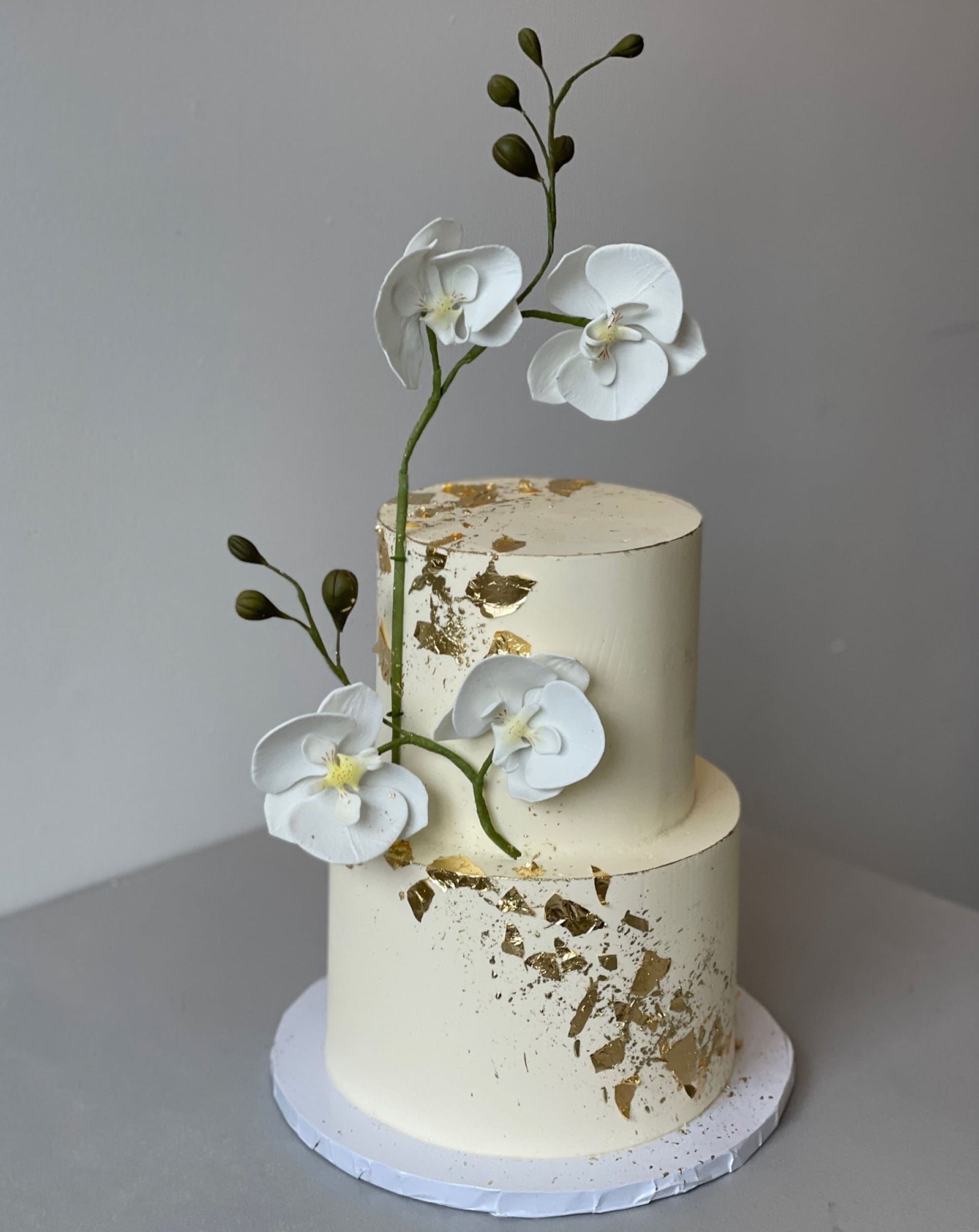 Sugar orchid stem on buttercream - custom cake