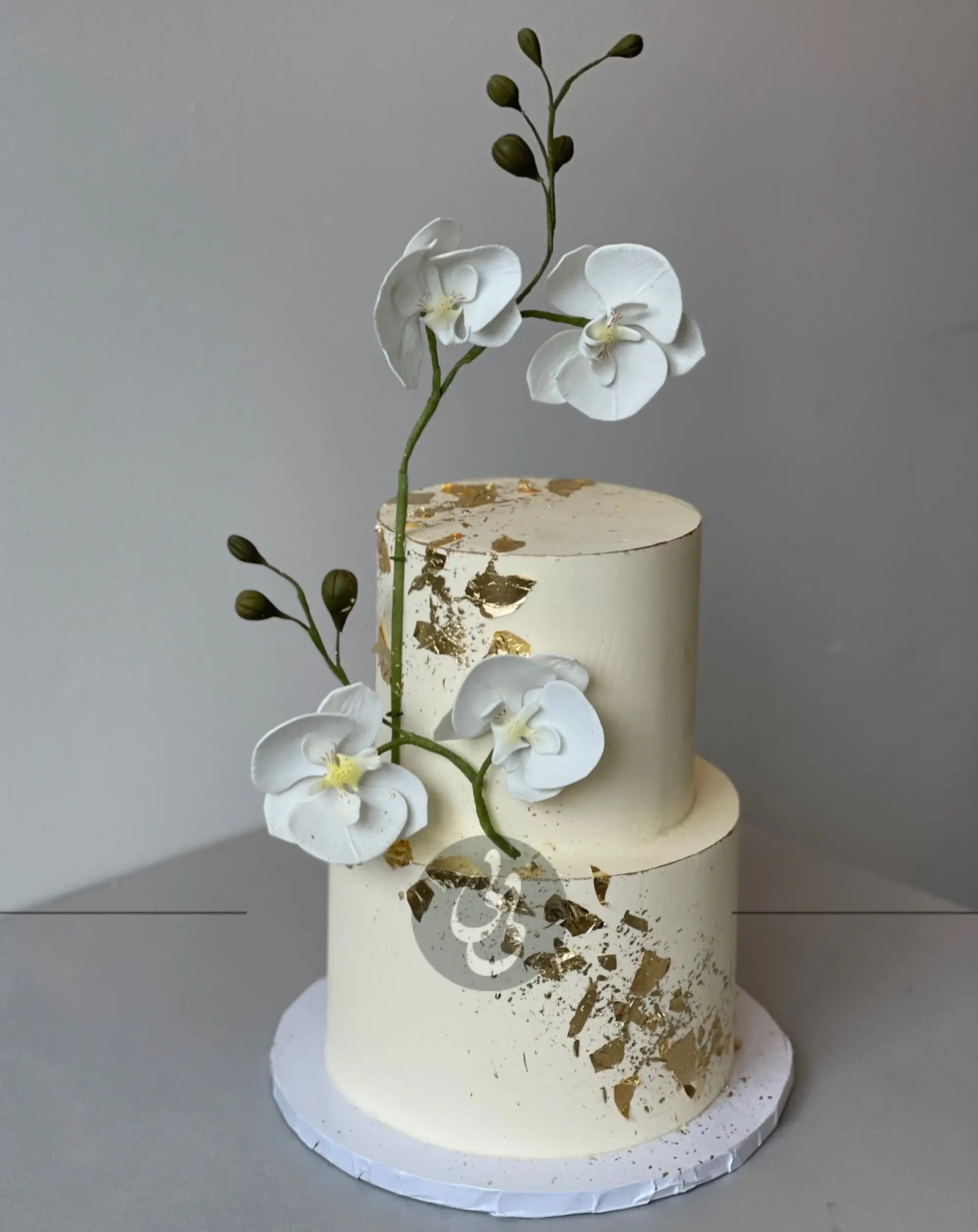 Sugar orchid stem on buttercream - custom cake
