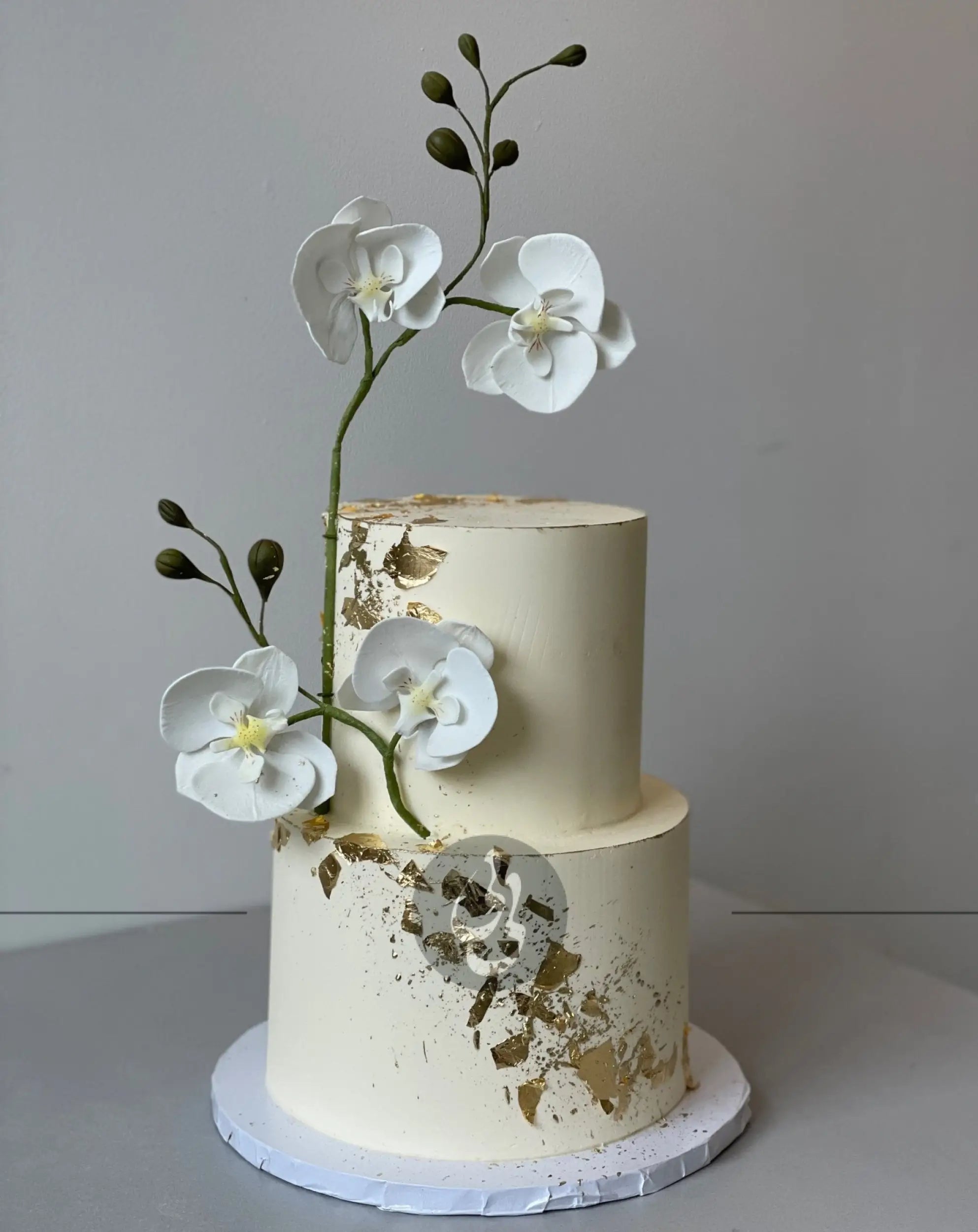 Sugar orchid stem on buttercream - custom cake