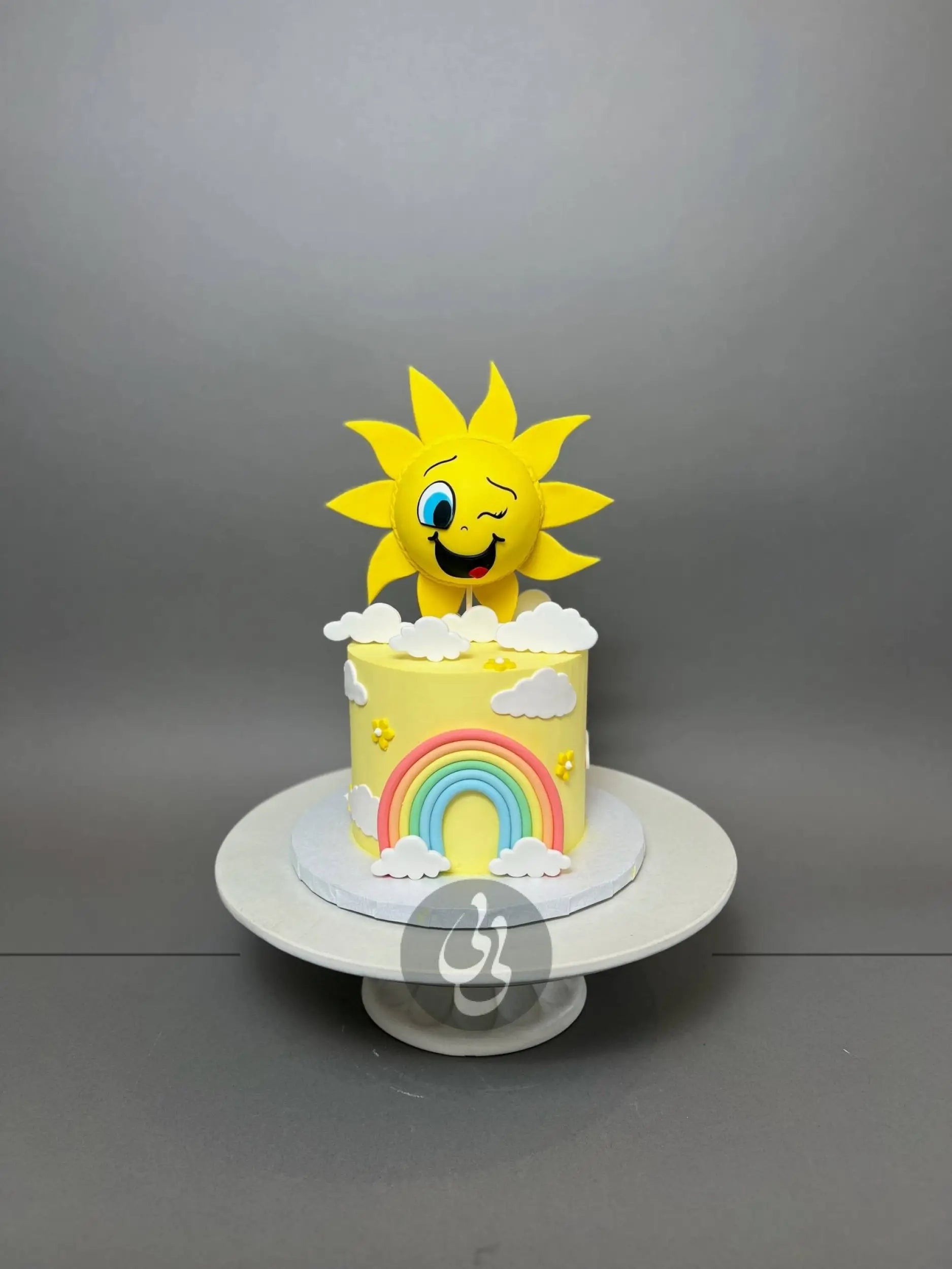 Sunshine & rainbow on buttercream - custom cake