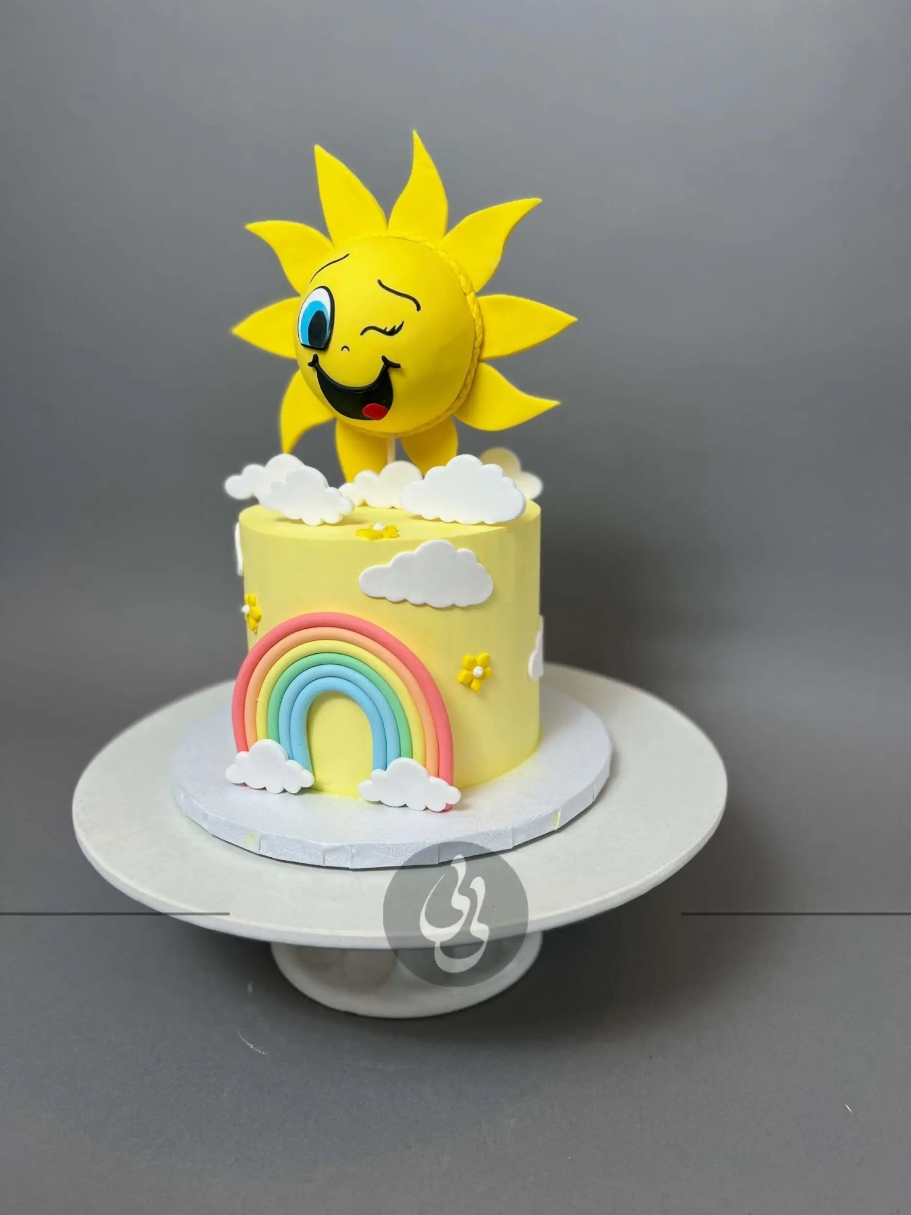 Sunshine & rainbow on buttercream - custom cake