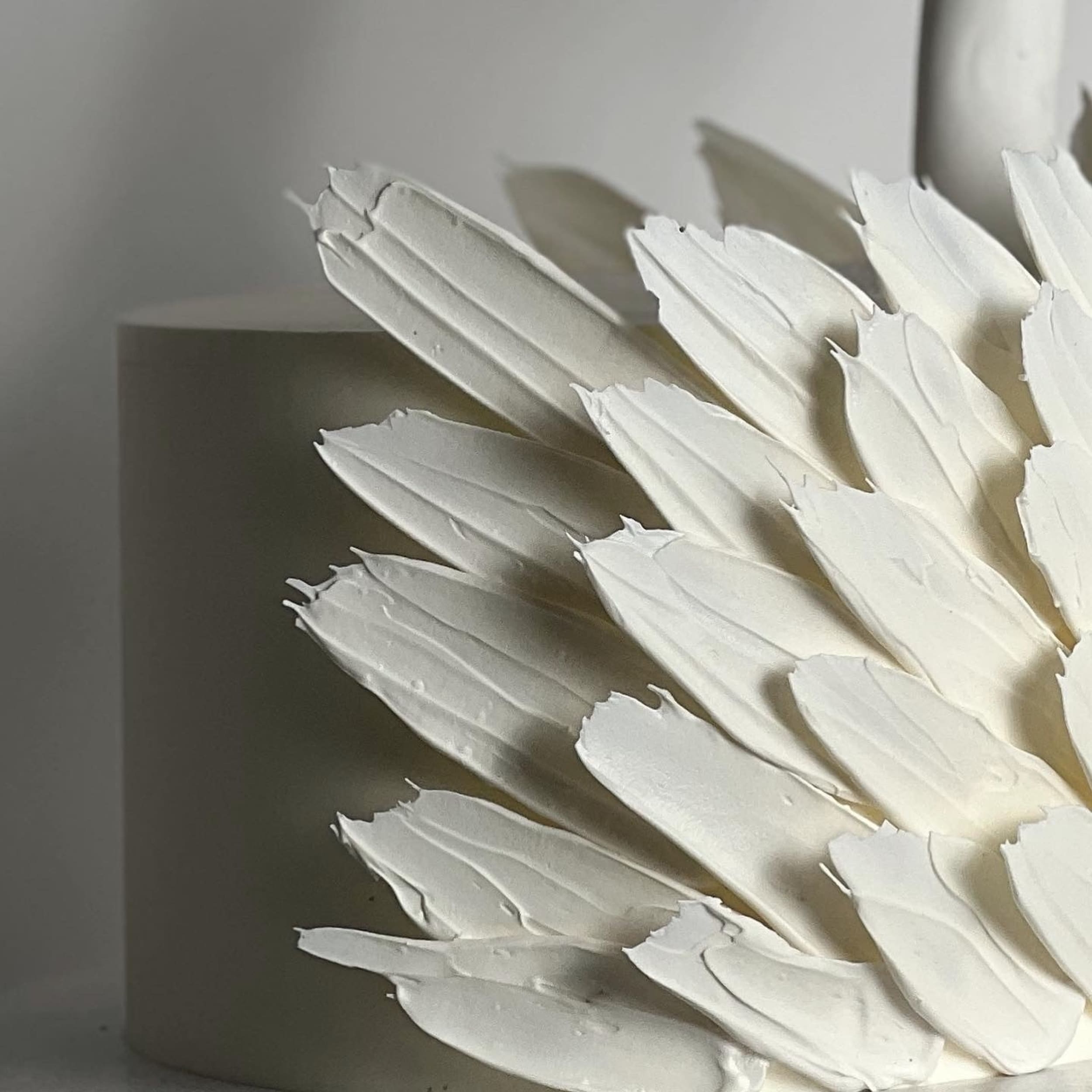 Swan & chocolate feathers on buttercream - custom cake