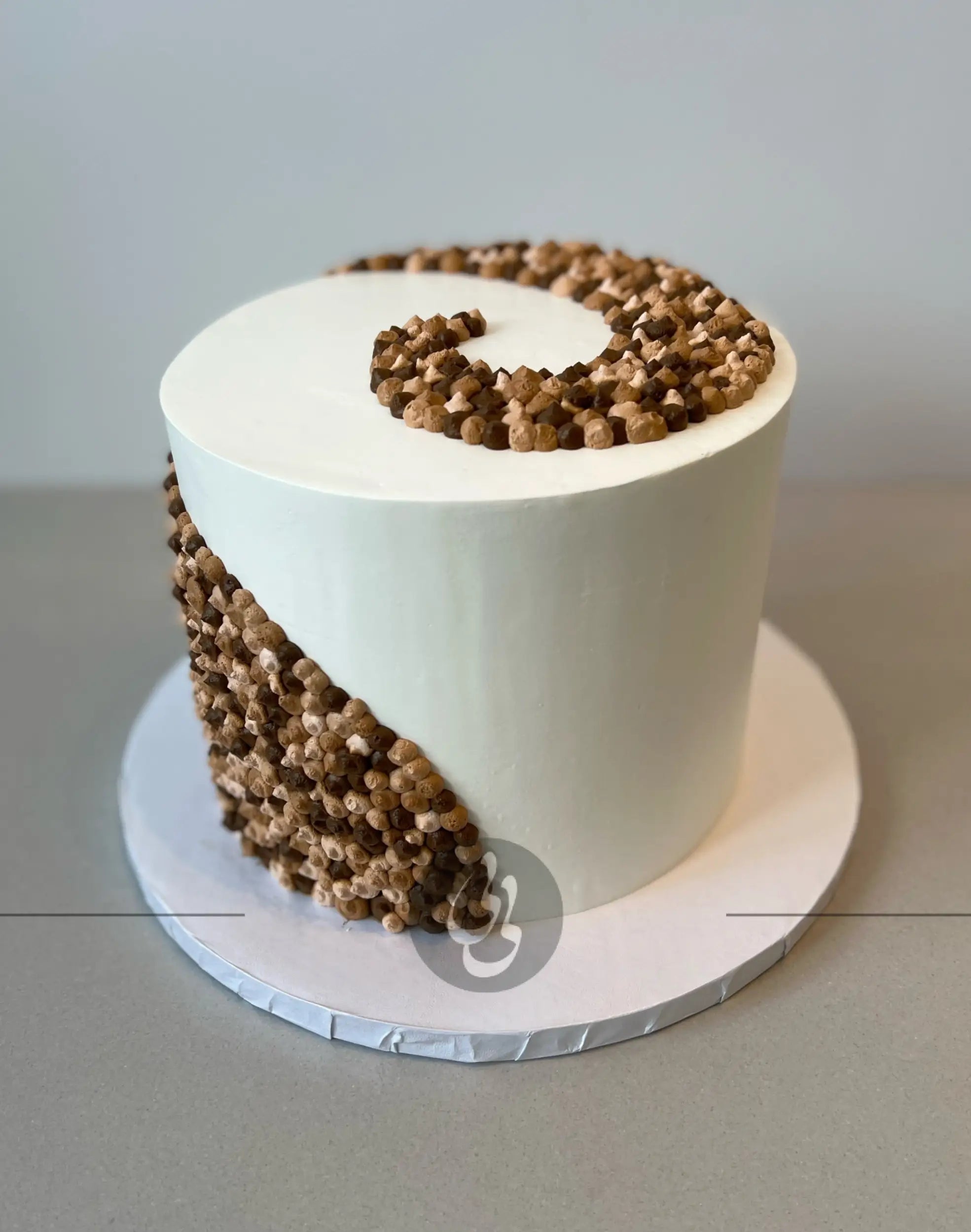 Swirl dots in whipped cream - custom cake