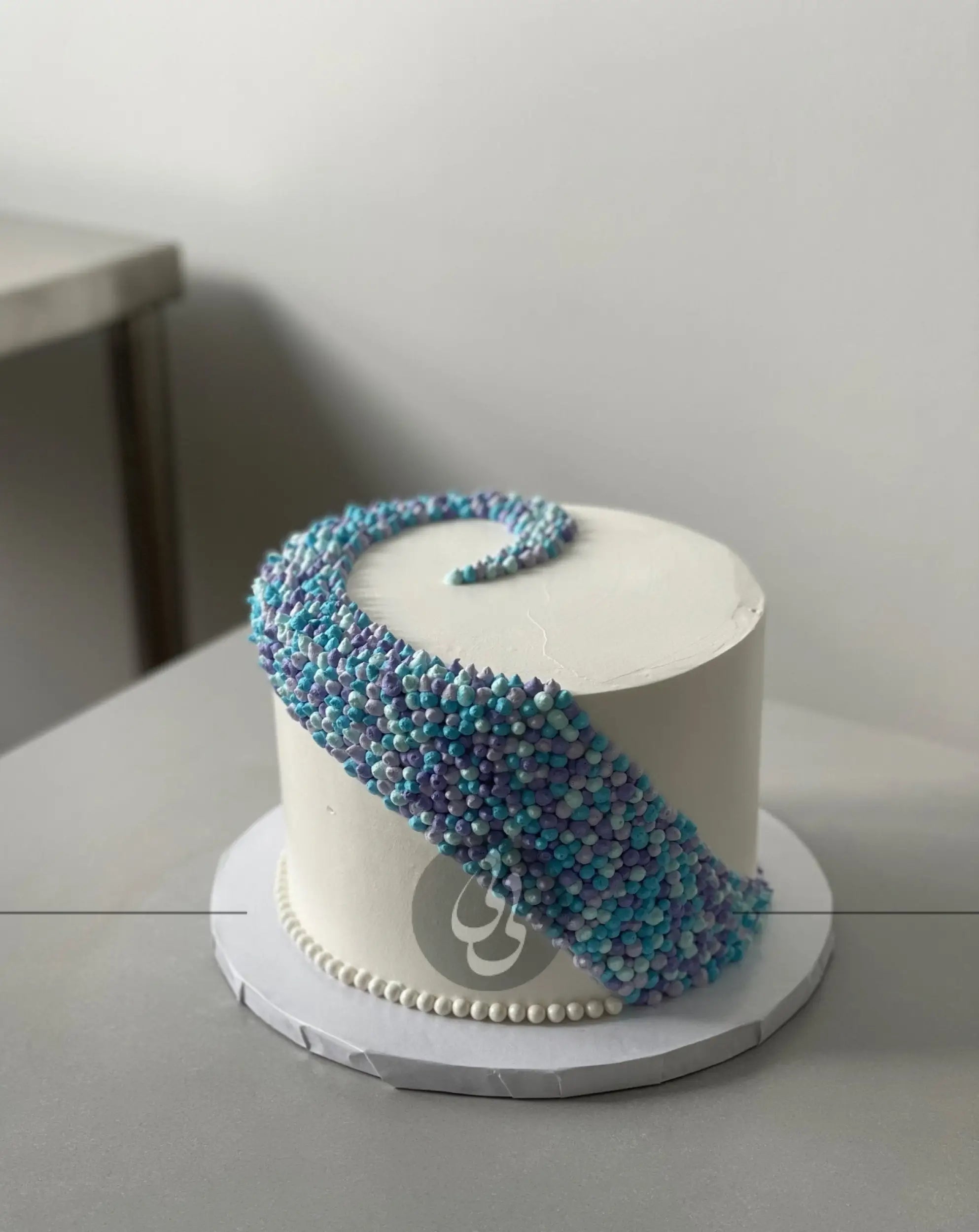 Swirl dots in whipped cream - custom cake