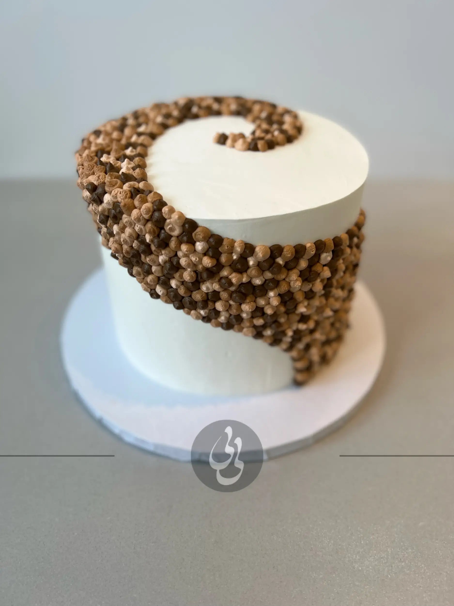 Swirl dots in whipped cream - custom cake