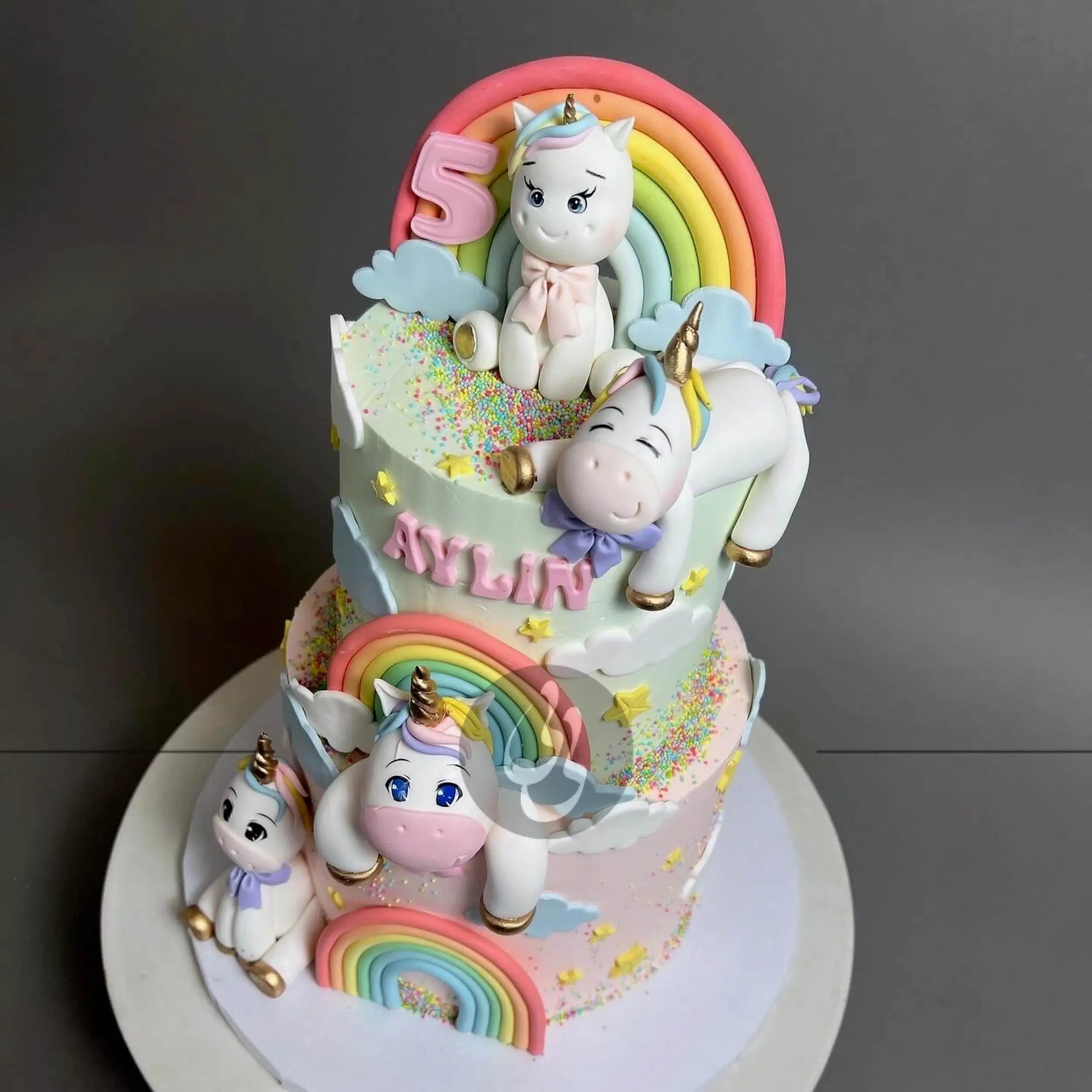 Unicorn and pastel rainbow - custom cake