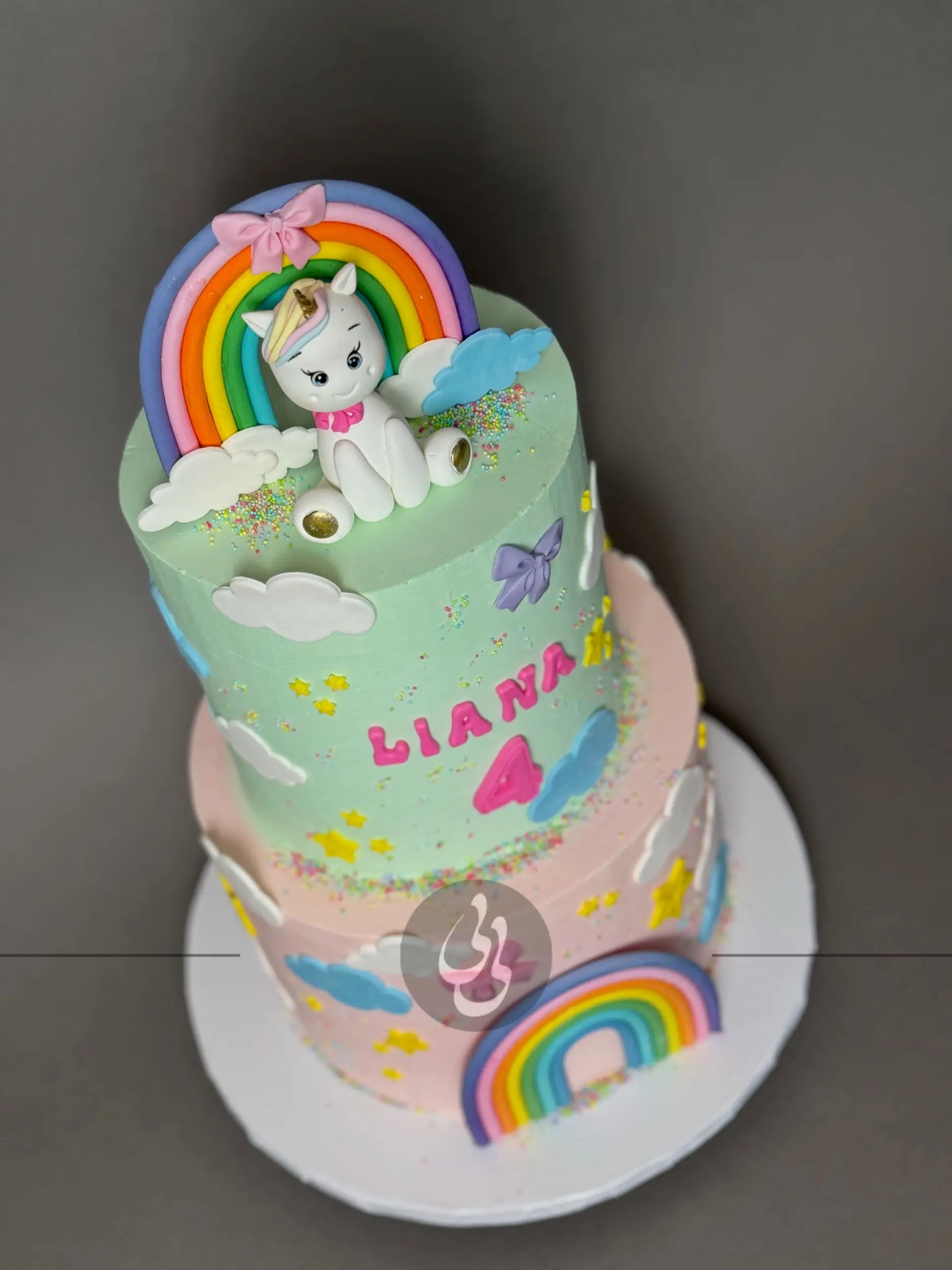 Unicorn and pastel rainbow - custom cake