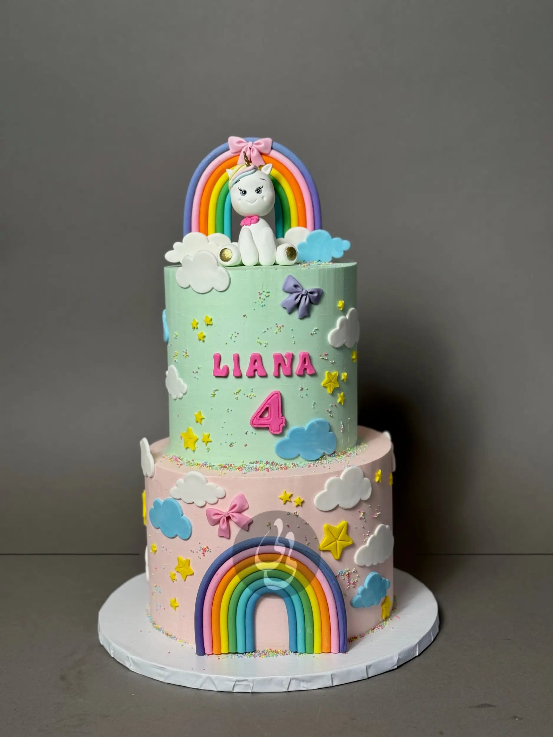 Unicorn and pastel rainbow - custom cake