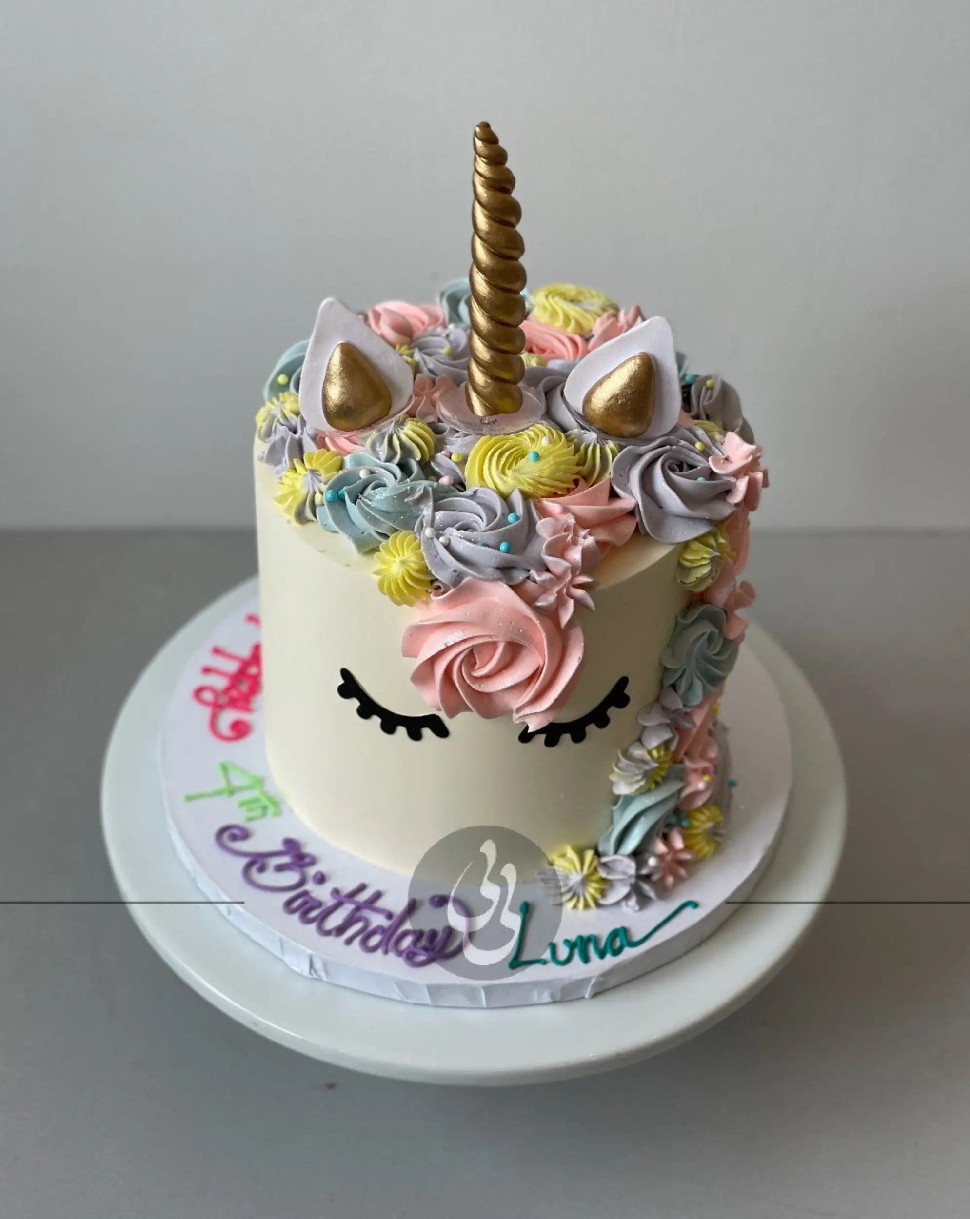Unicorn face on buttercream - custom cake