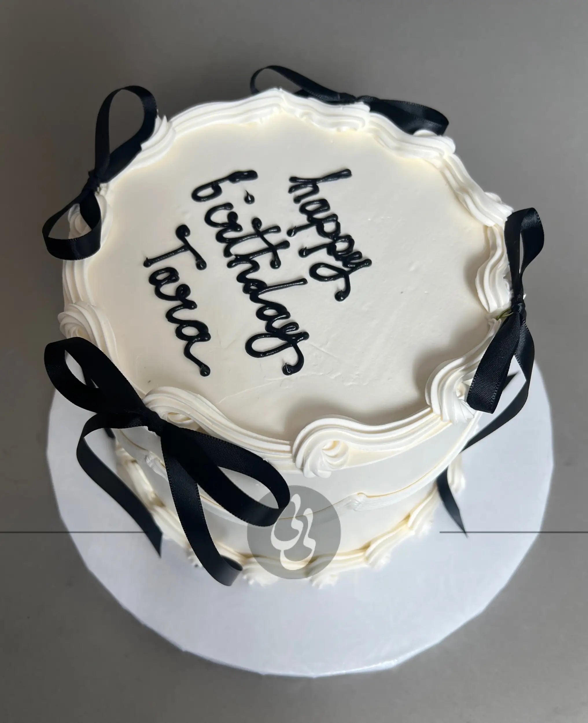 Whipped cream lambeth bow cake - custom cake