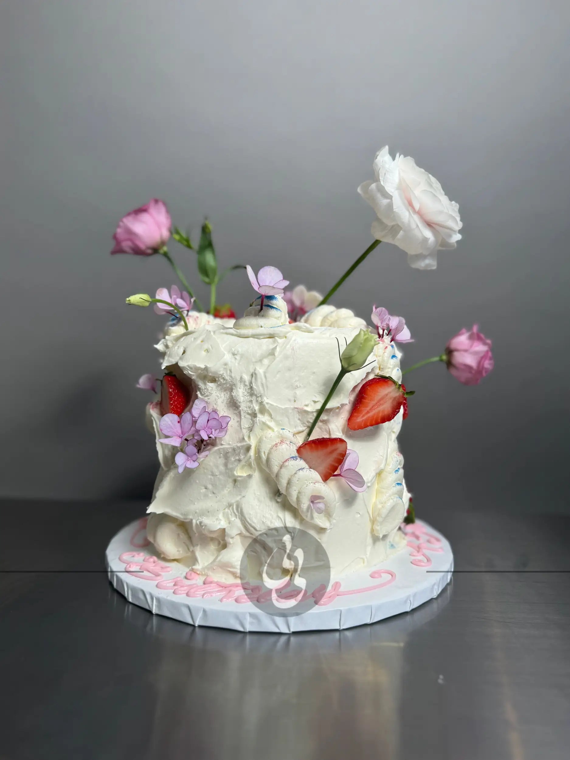 Wild fresh flowers & strawberries on buttercream - custom cake