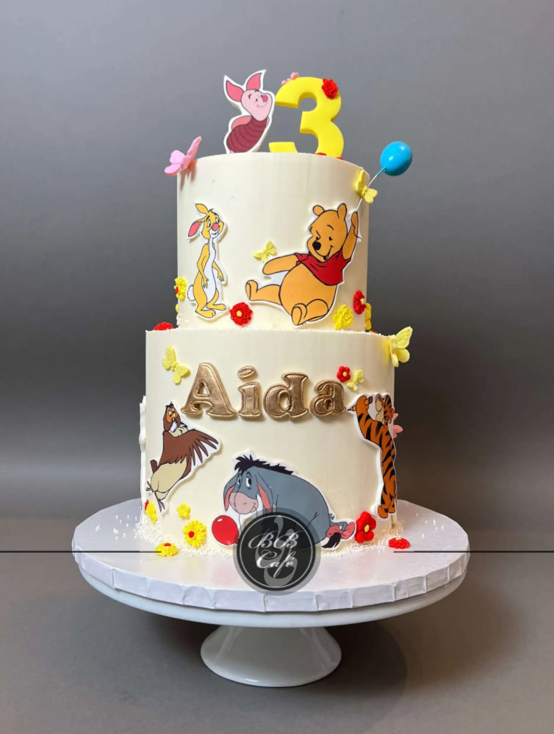 Winnie the pooh edible print on buttercream - custom cake