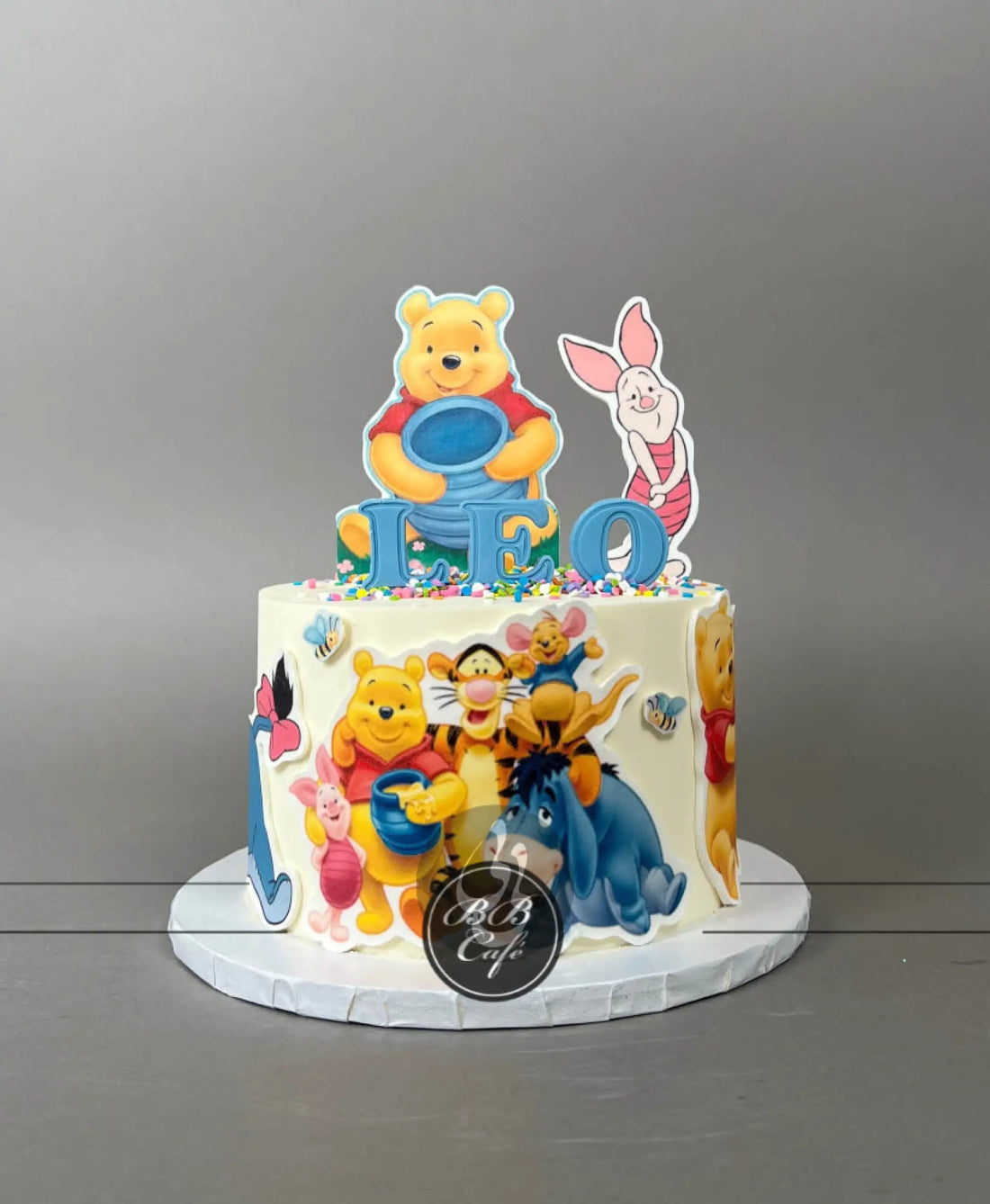 Winnie the pooh edible print on buttercream - custom cake