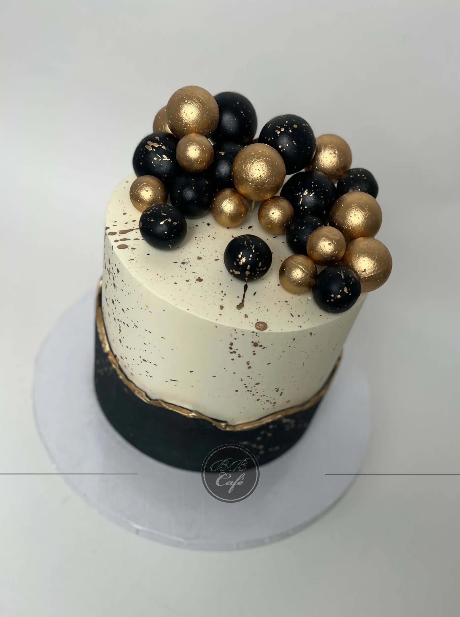 Layered spheres on buttercream - custom cake