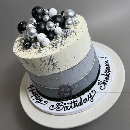 Layered spheres on buttercream - custom cake