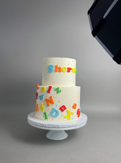 Alphabets on buttercream - custom cake