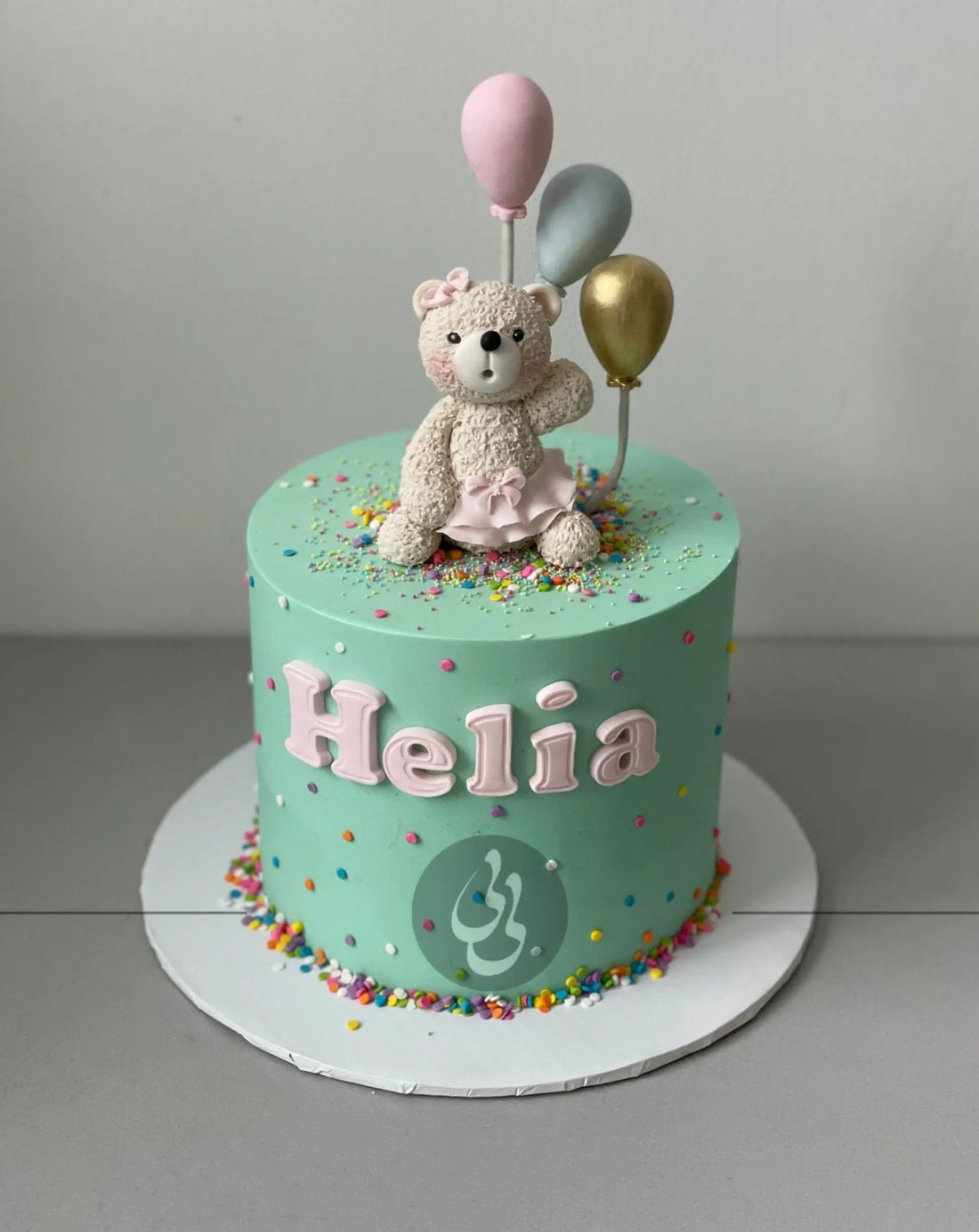 Animal & balloons on buttercream - custom cake