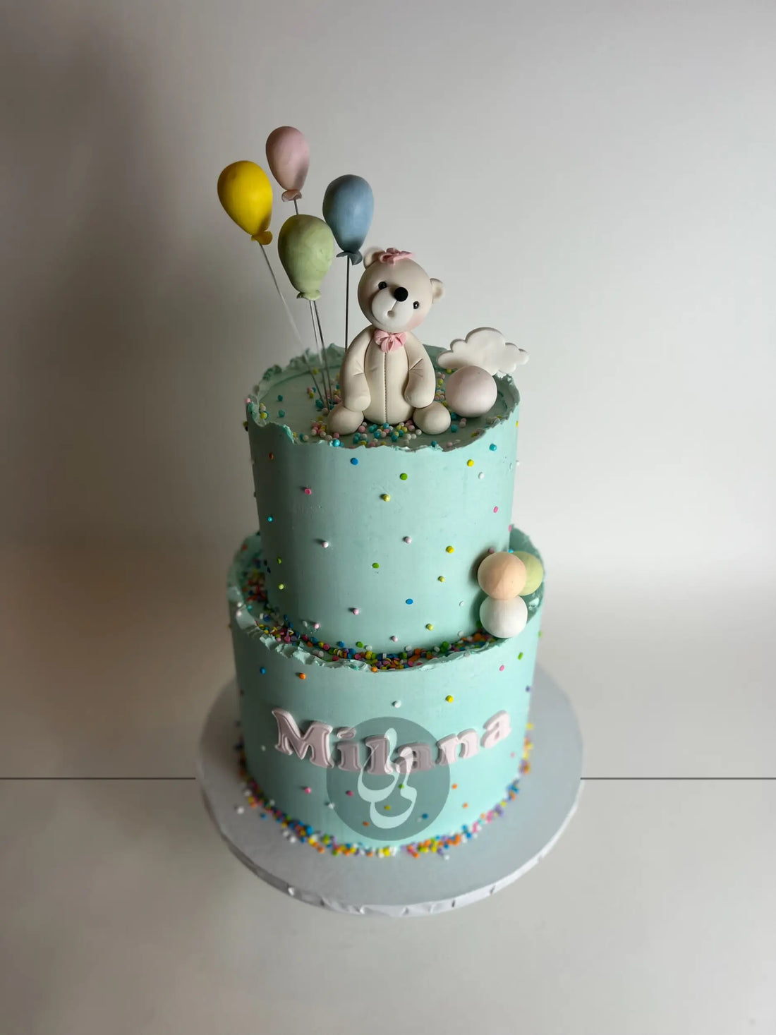 Animal & balloons on buttercream - custom cake
