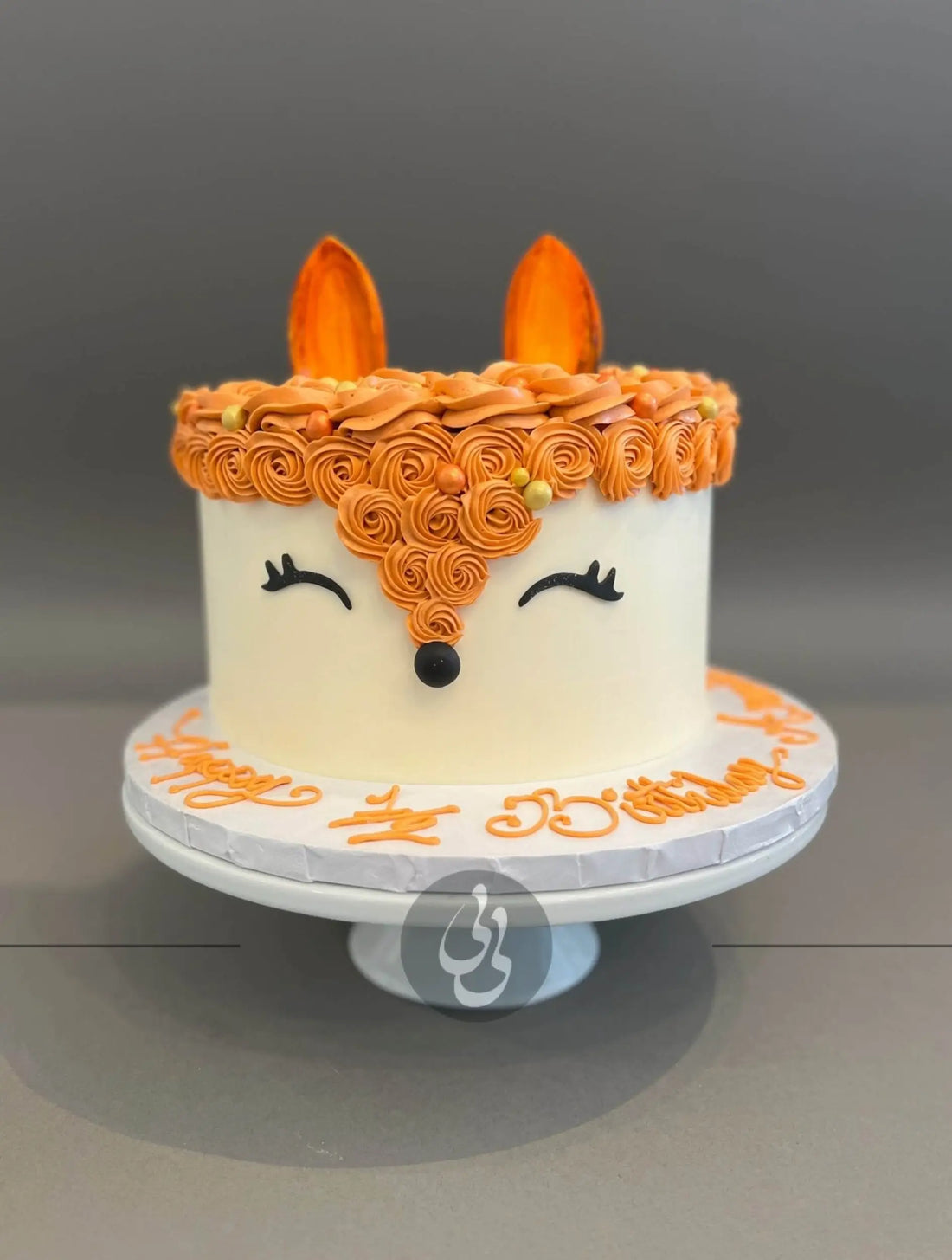 Animal face on buttercream - custom cake