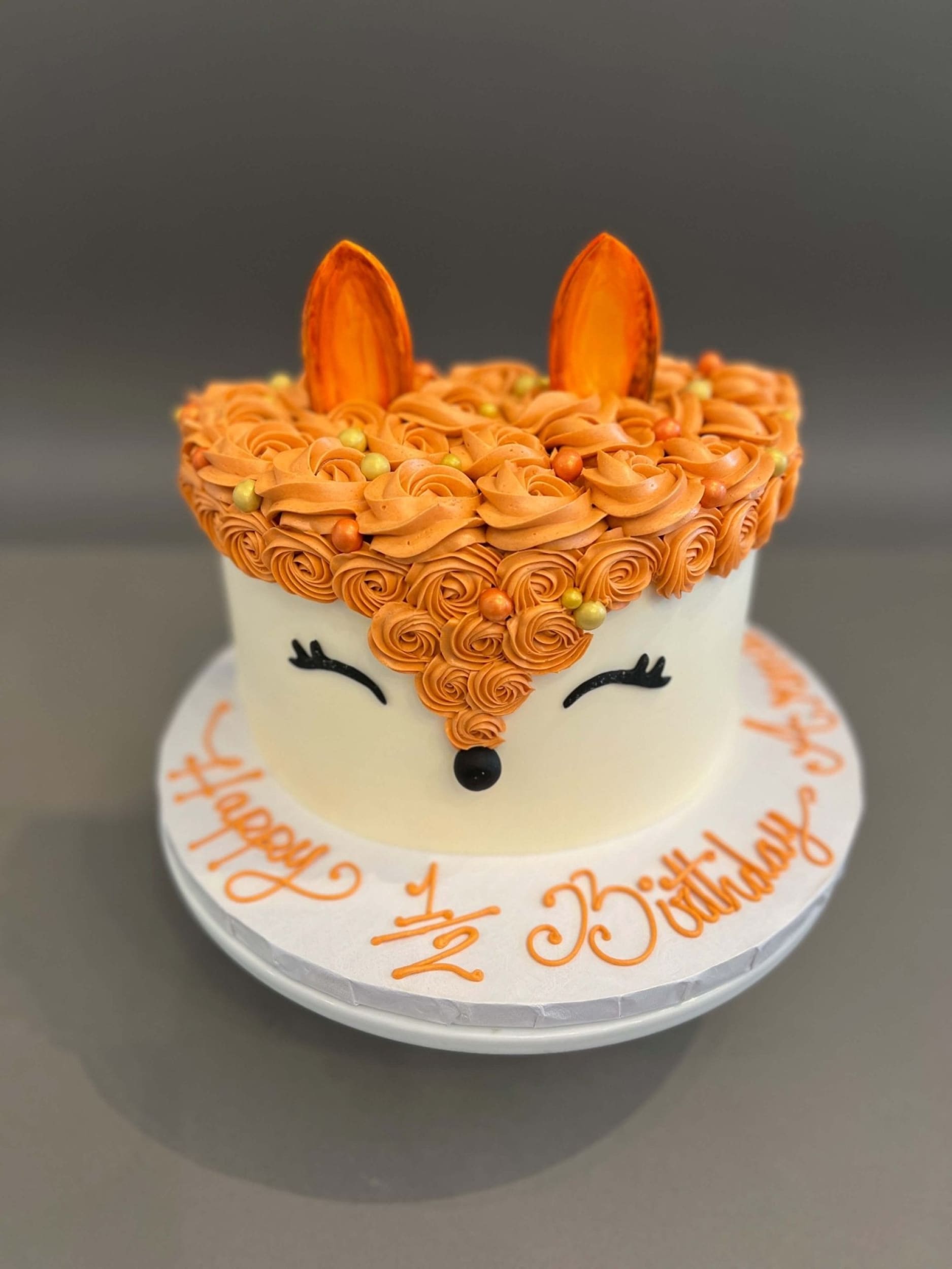 Animal face on buttercream - custom cake