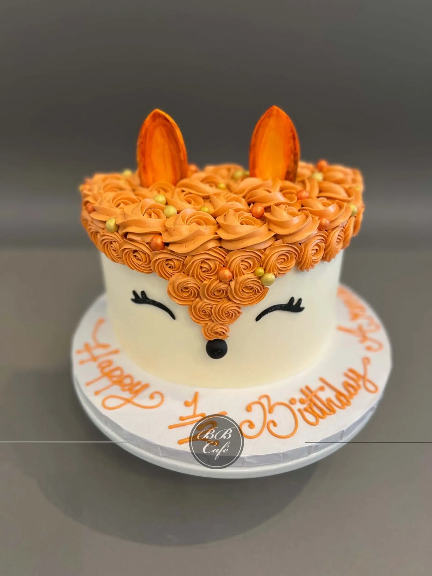Animal face on buttercream - custom cake