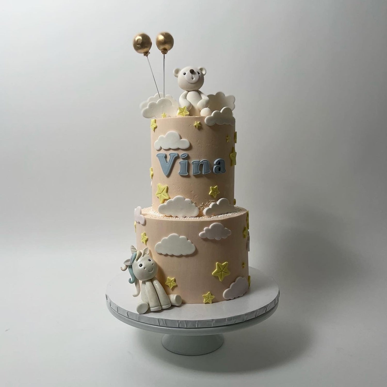 Animals &amp; clouds on buttercream - custom cake