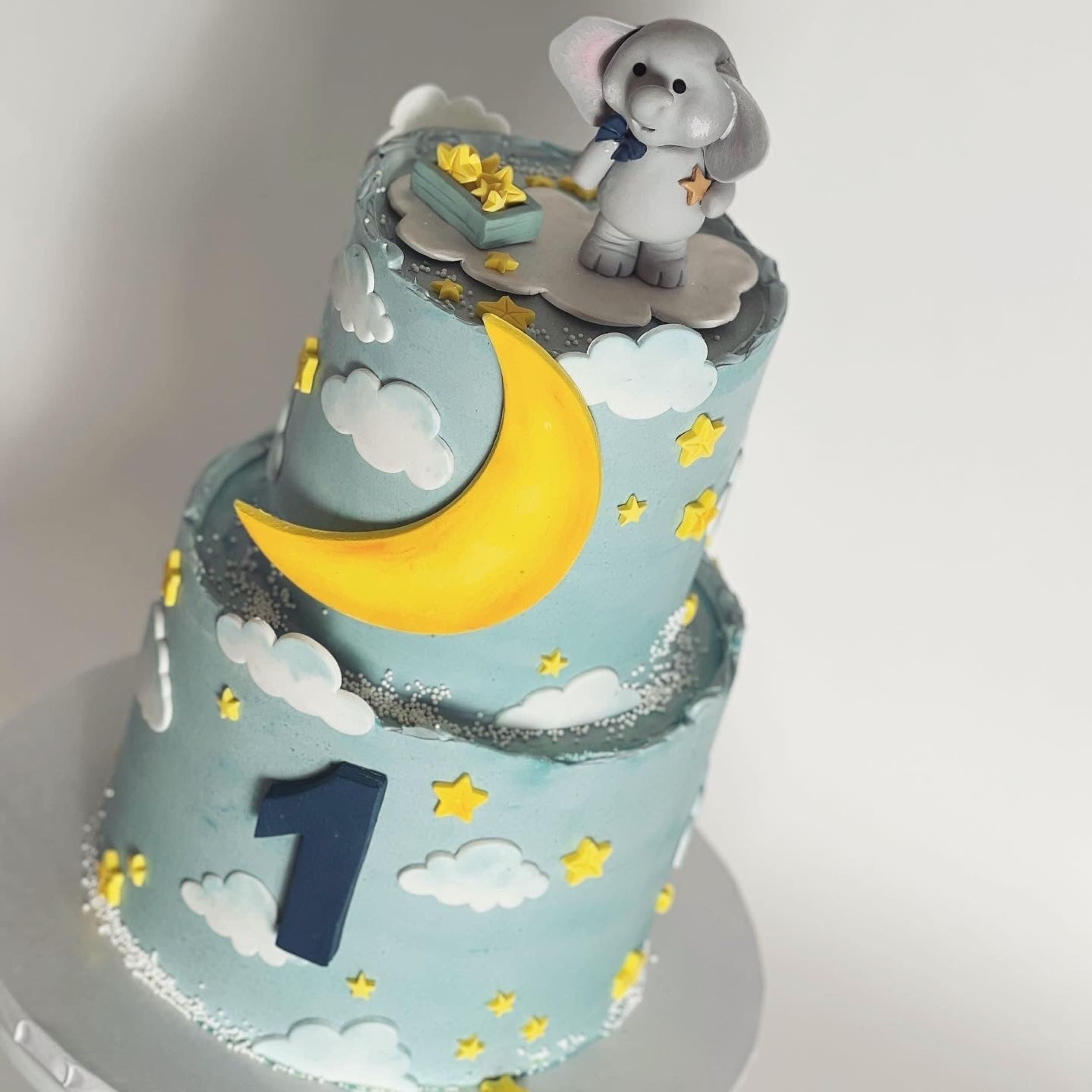 Animals stars &amp; moon on buttercream - custom cake