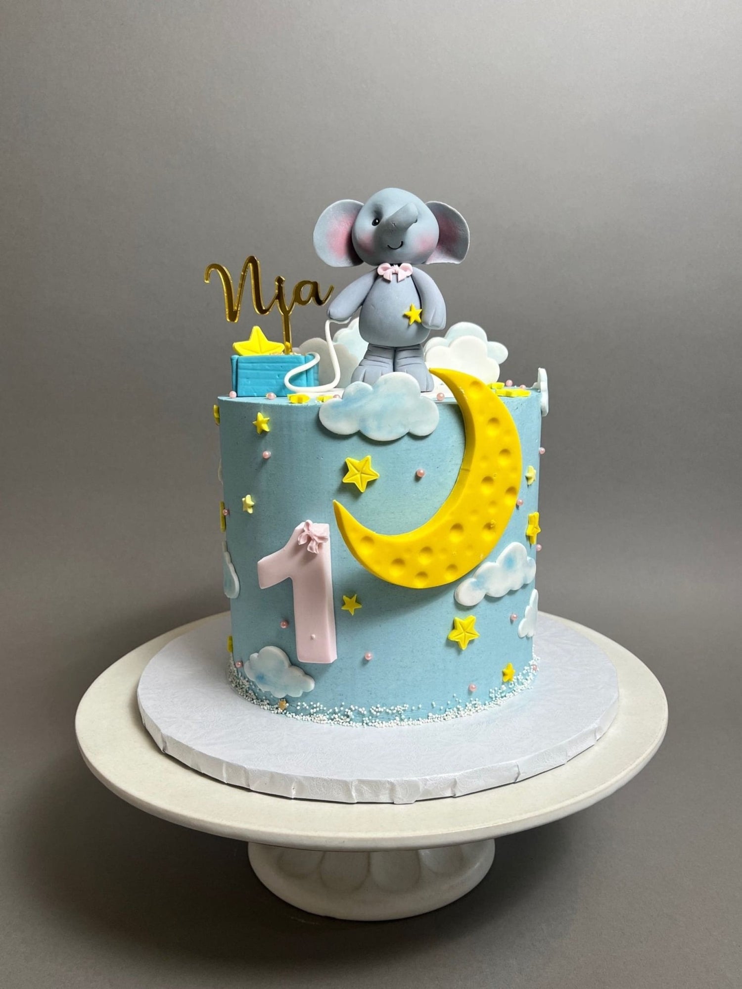 Animals stars &amp; moon on buttercream - custom cake