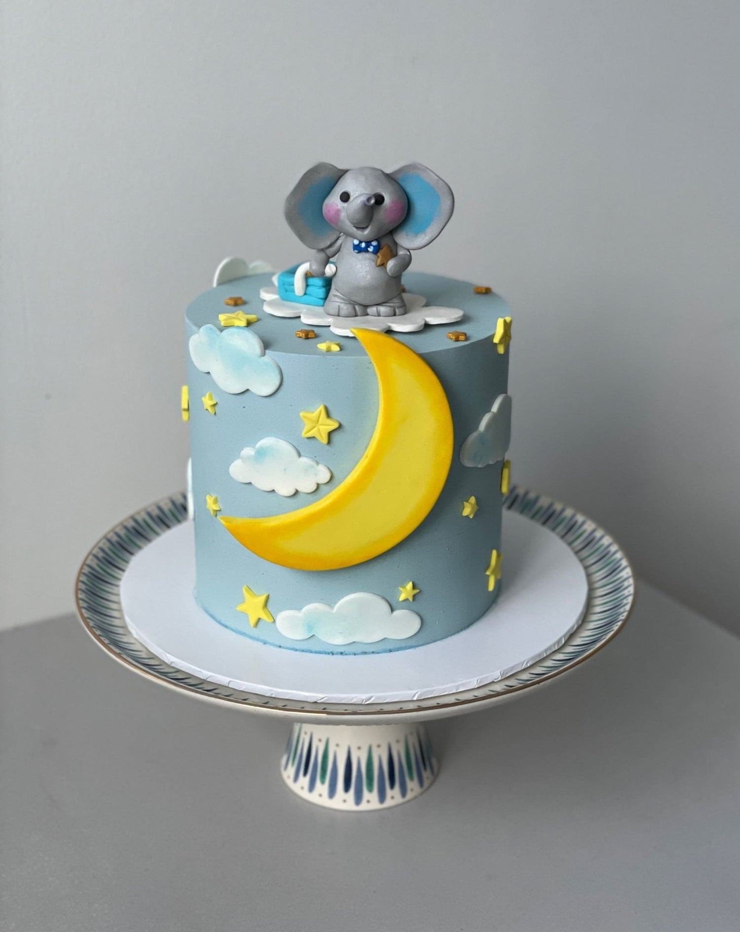 Animals stars &amp; moon on buttercream - custom cake