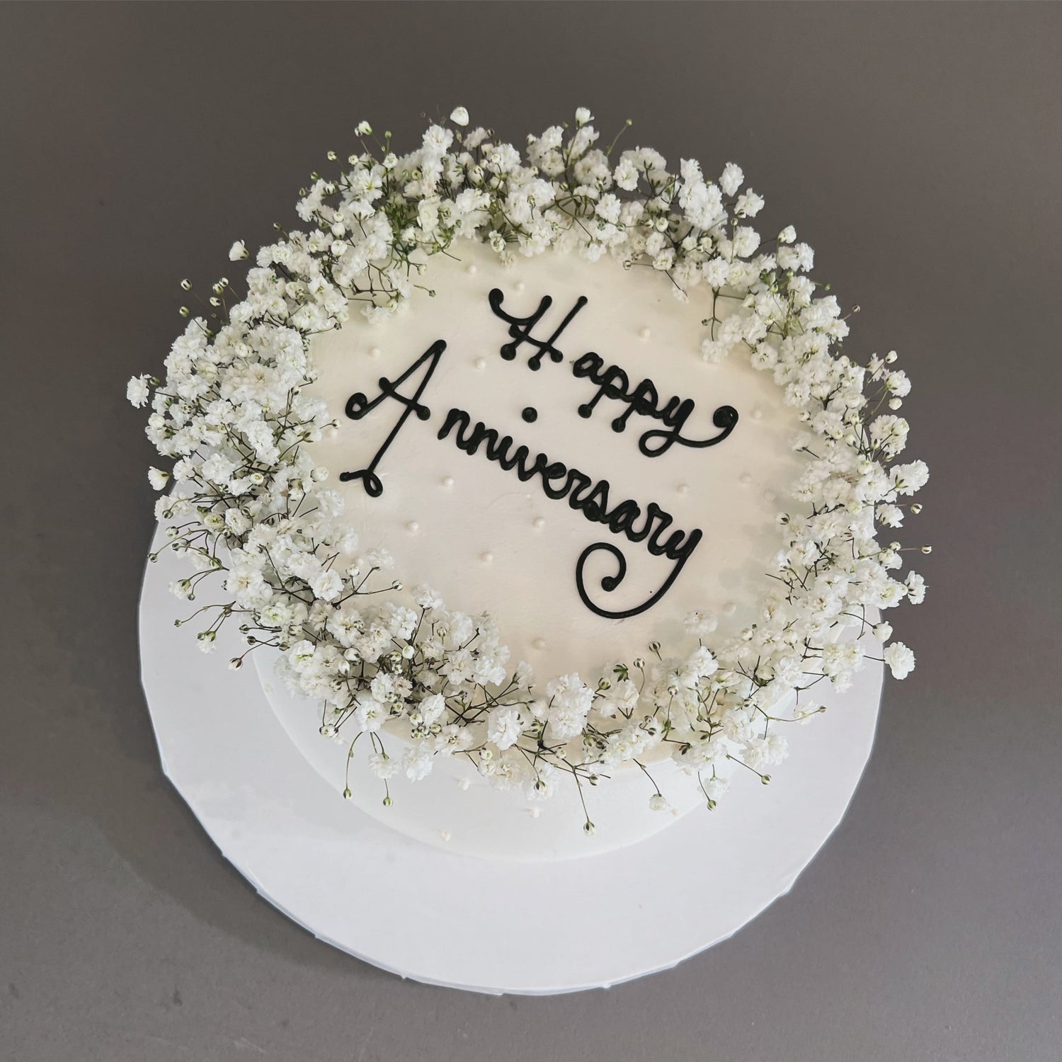 Baby’s breath on whipped cream - custom cake
