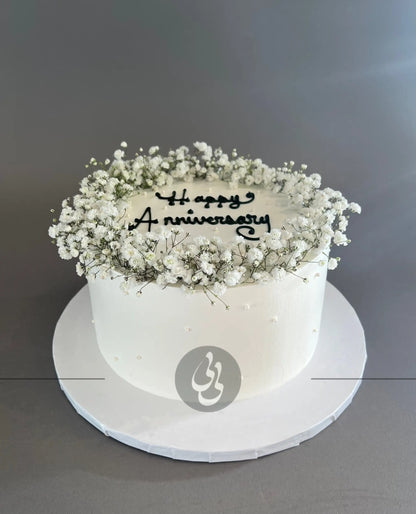 Baby’s breath on whipped cream - custom cake