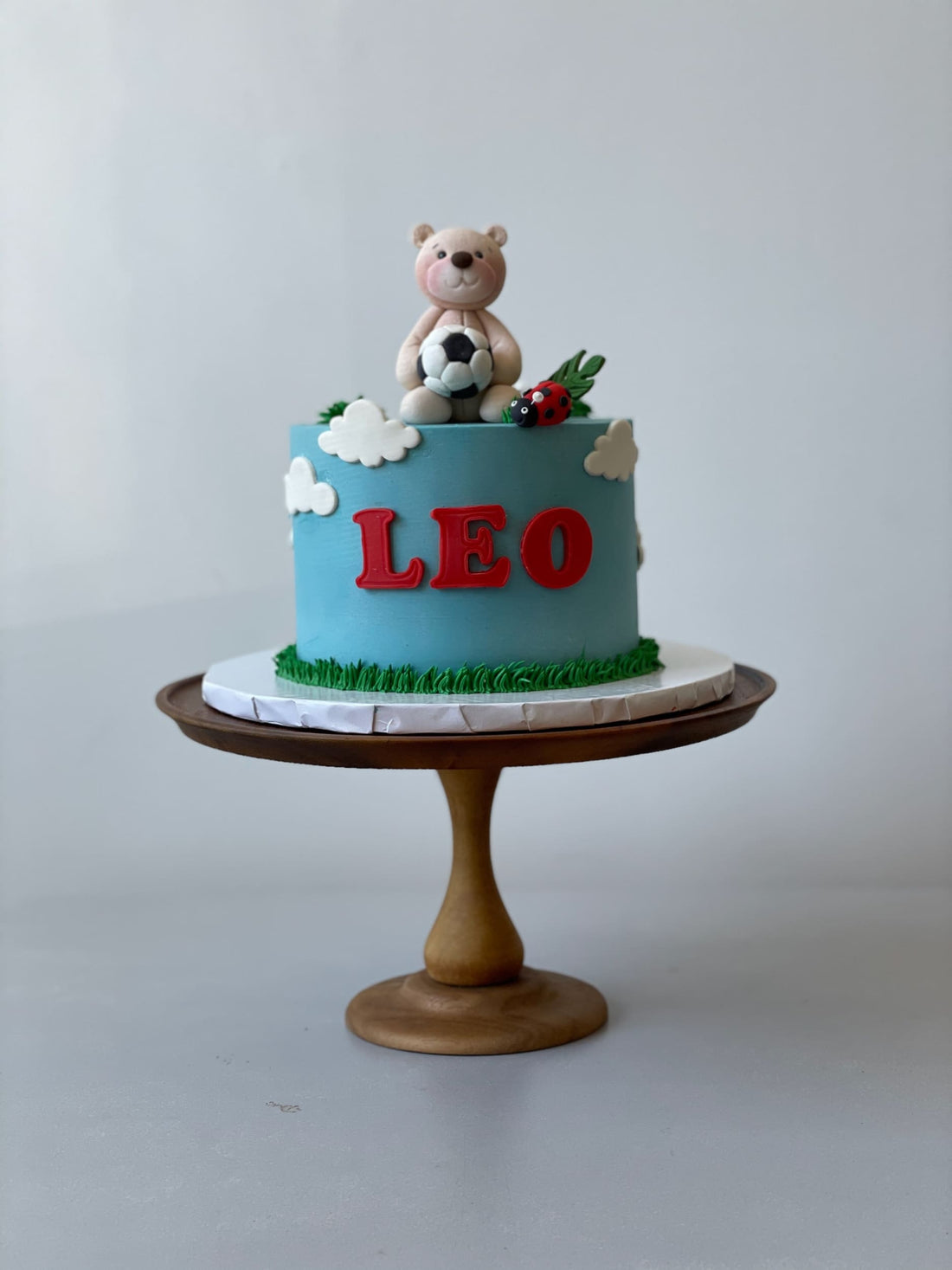 Bear &amp; soccer on buttercream - custom cake