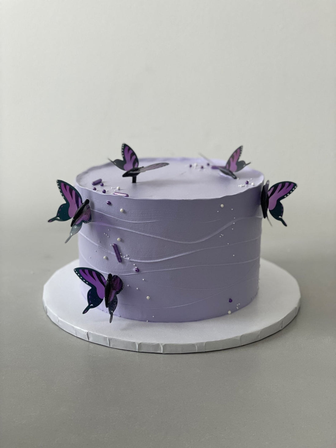 Butterfly on whipped cream - custom cake