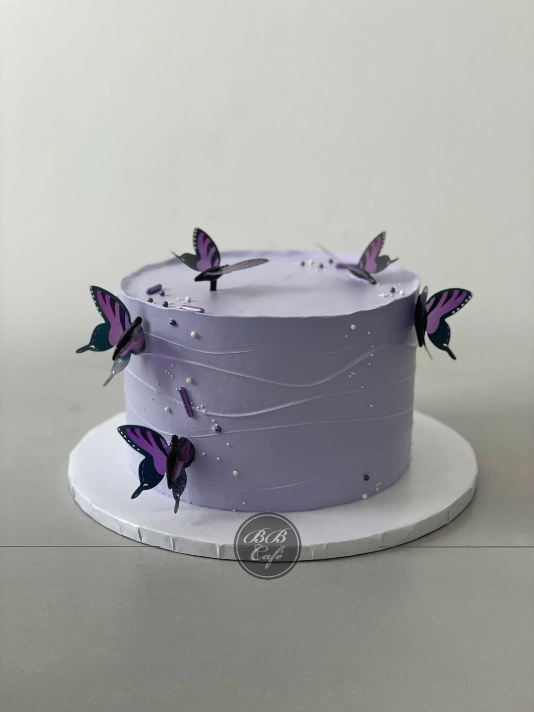Butterfly on whipped cream - custom cake