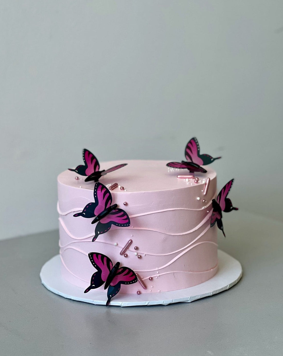 Butterfly on whipped cream - custom cake