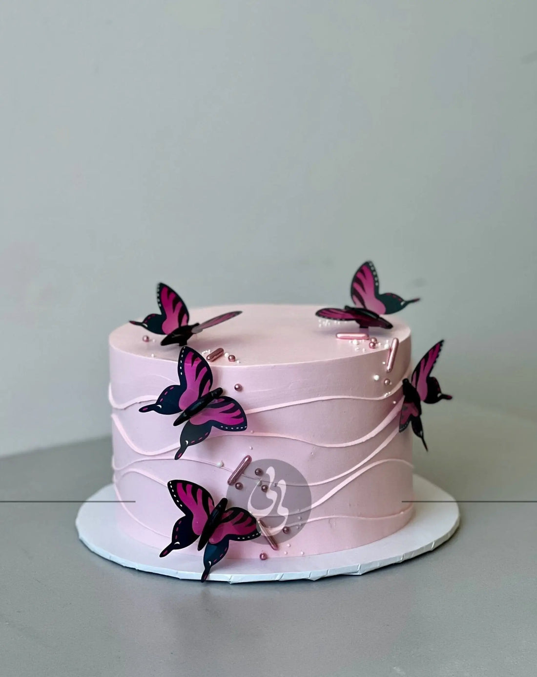 Butterfly on whipped cream - custom cake