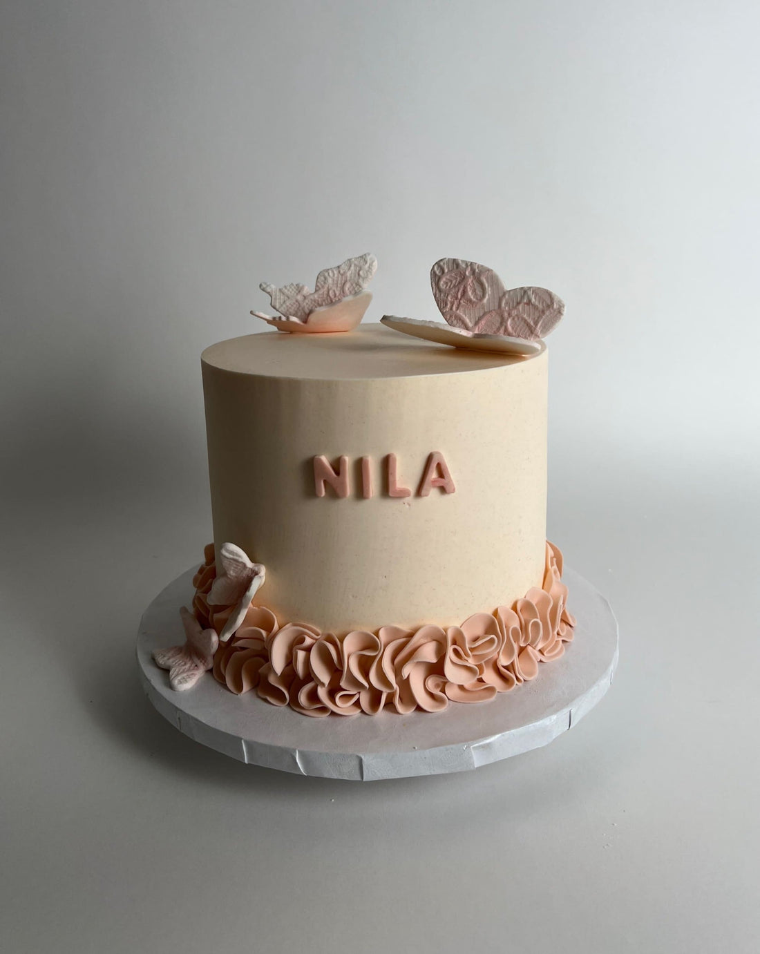 Butterfly & ruffles - custom cake