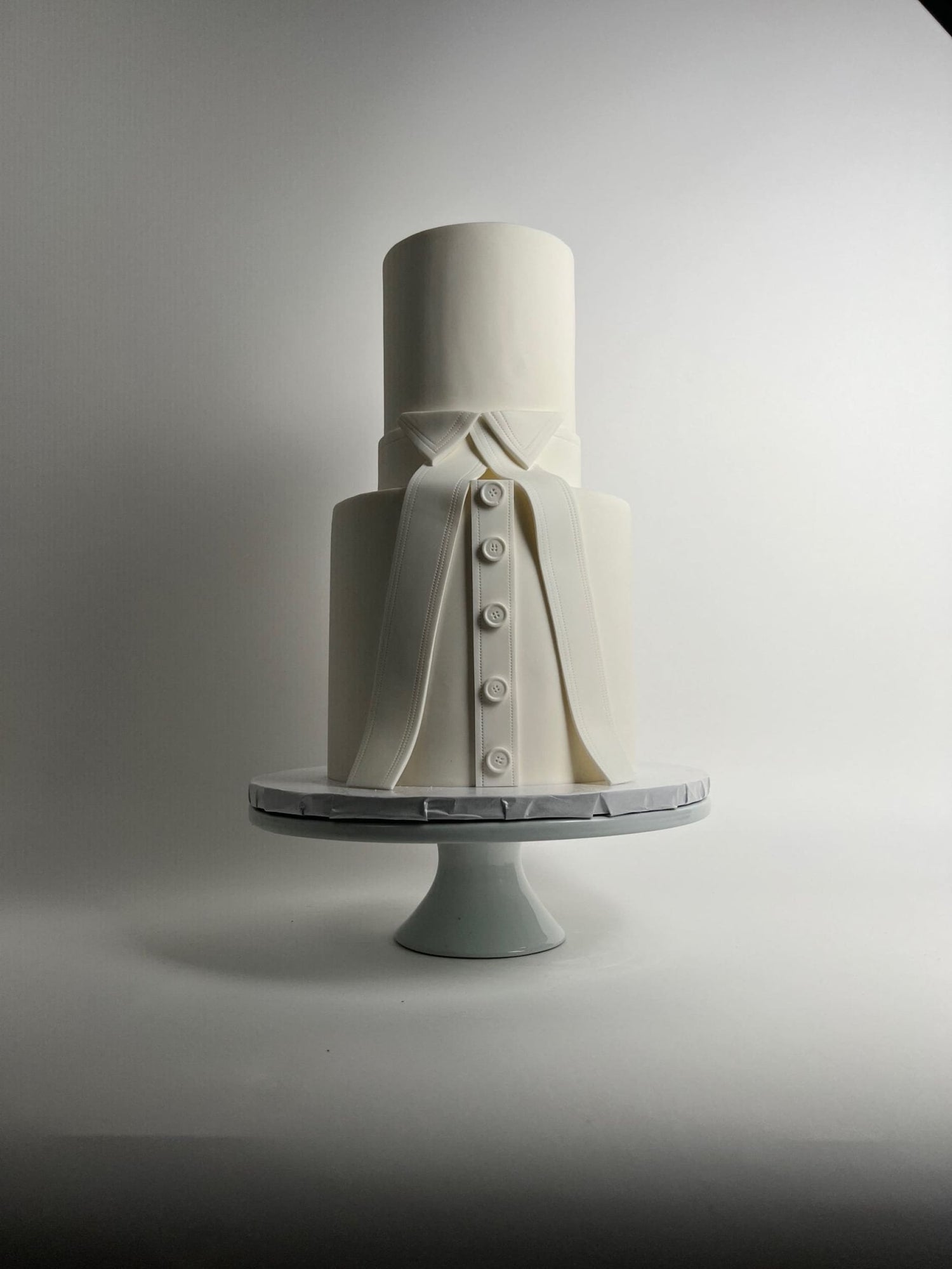 Called to the bar in white fondant - custom cake