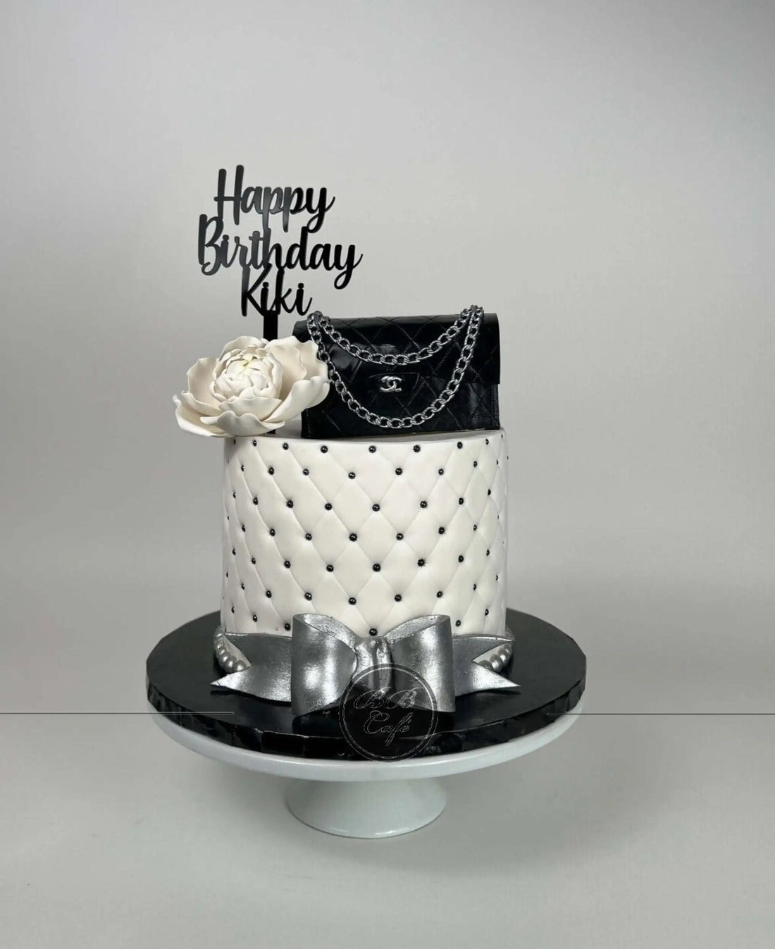 Chanel bag &amp; sugar flower on quilted fondant - custom cake